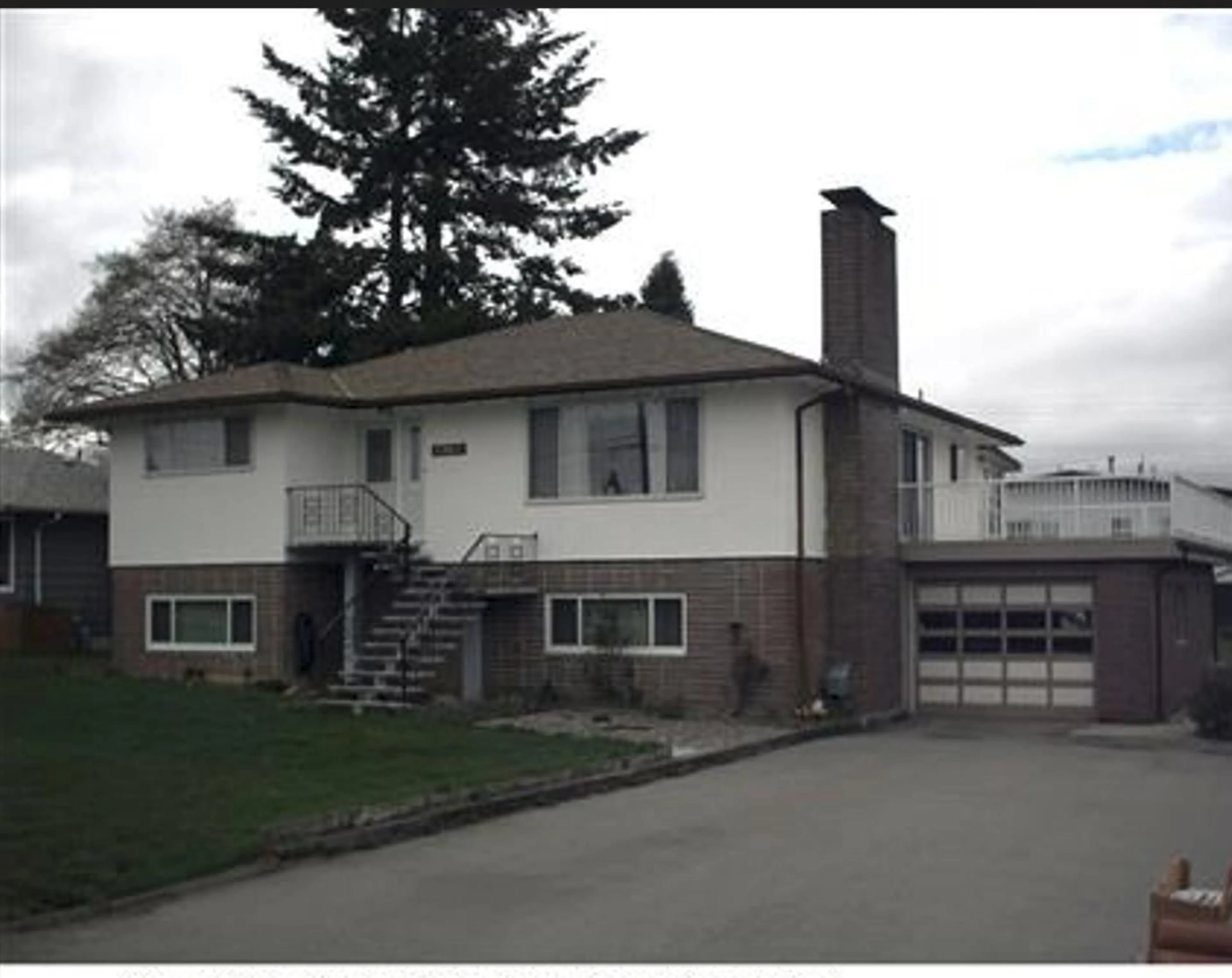 Frontside or backside of a home, the front or back of building for 11867 86A AVENUE, Delta British Columbia V4C3A1