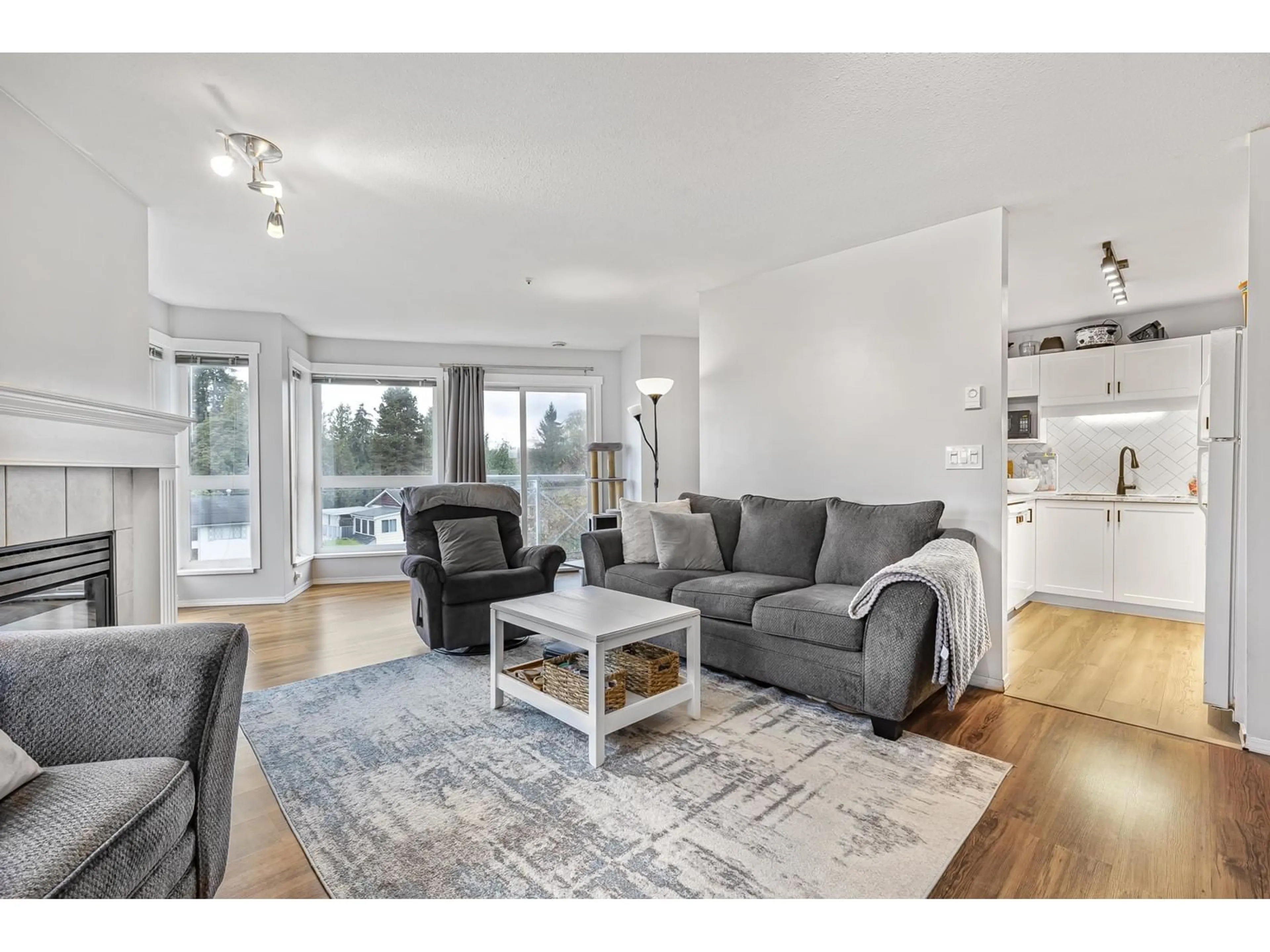 Living room, wood floors for 309 20245 53 AVENUE, Langley British Columbia V3A3V2