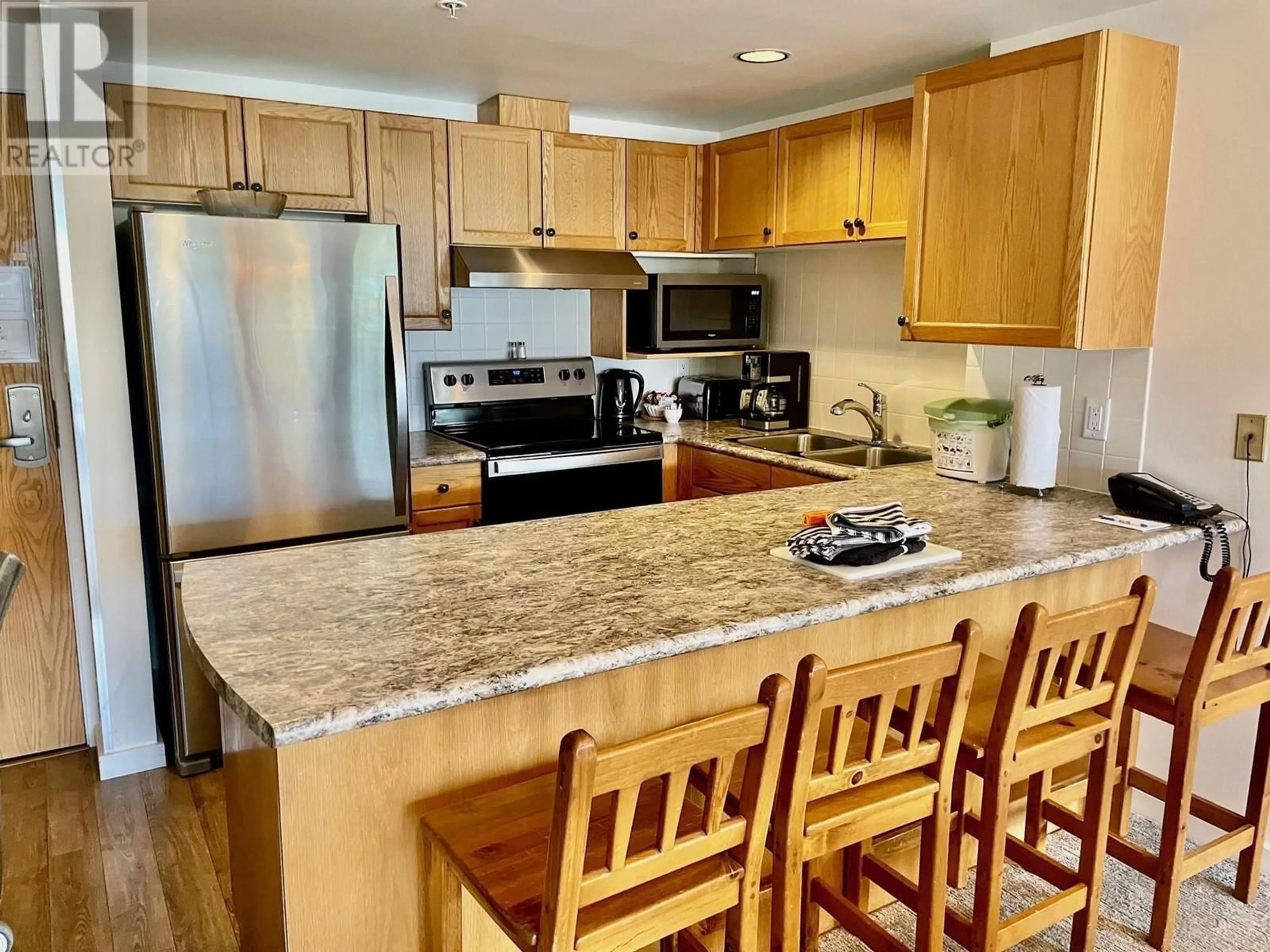 Open concept kitchen for 305 wk1&2-4910 SPEARHEAD PLACE, Whistler British Columbia V0N1B4