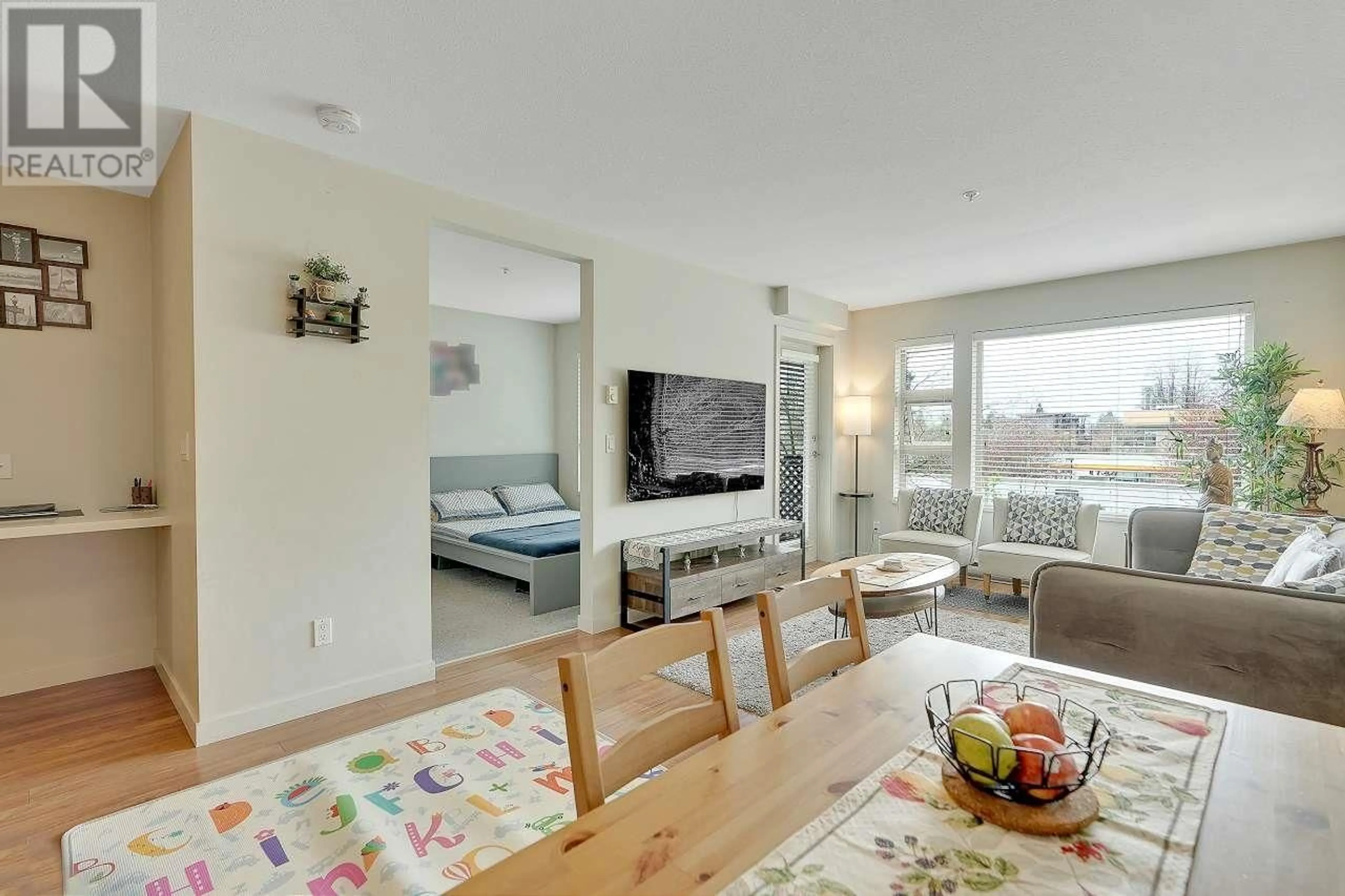 Living room, wood floors for 306 1677 LLOYD AVENUE, North Vancouver British Columbia V7P0B1