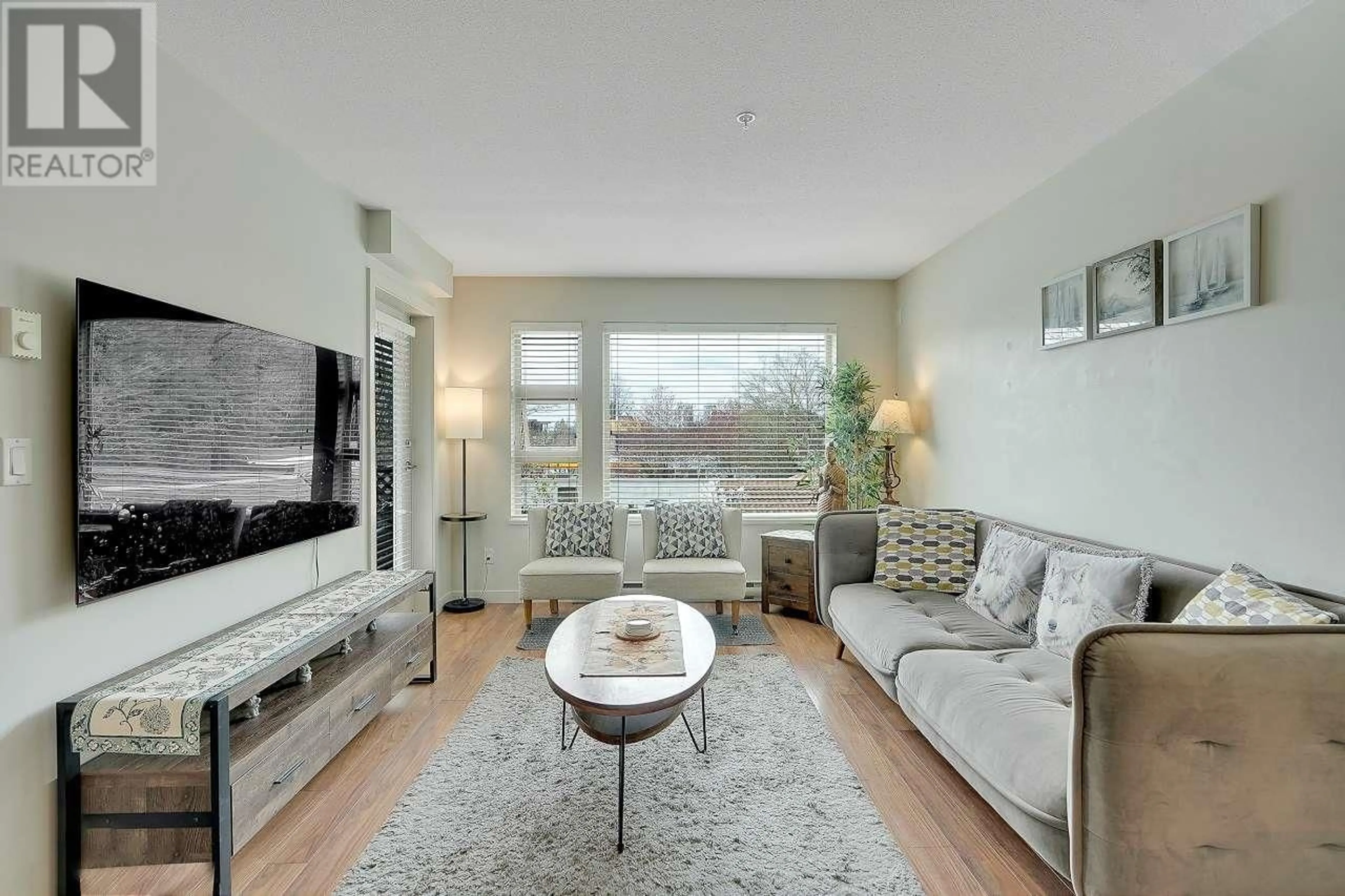 Living room, wood floors for 306 1677 LLOYD AVENUE, North Vancouver British Columbia V7P0B1