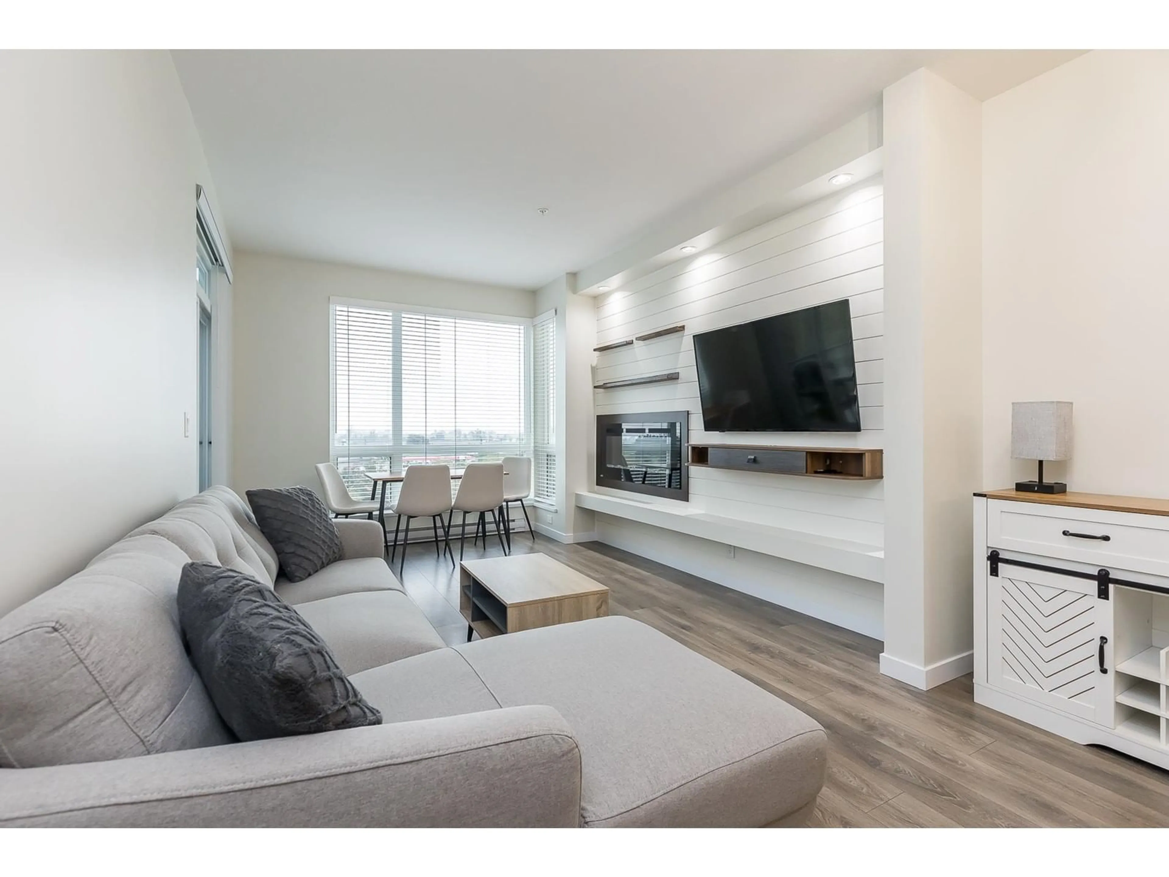 Living room, wood floors for 305 2242 WHATCOM ROAD, Abbotsford British Columbia V3G0G3