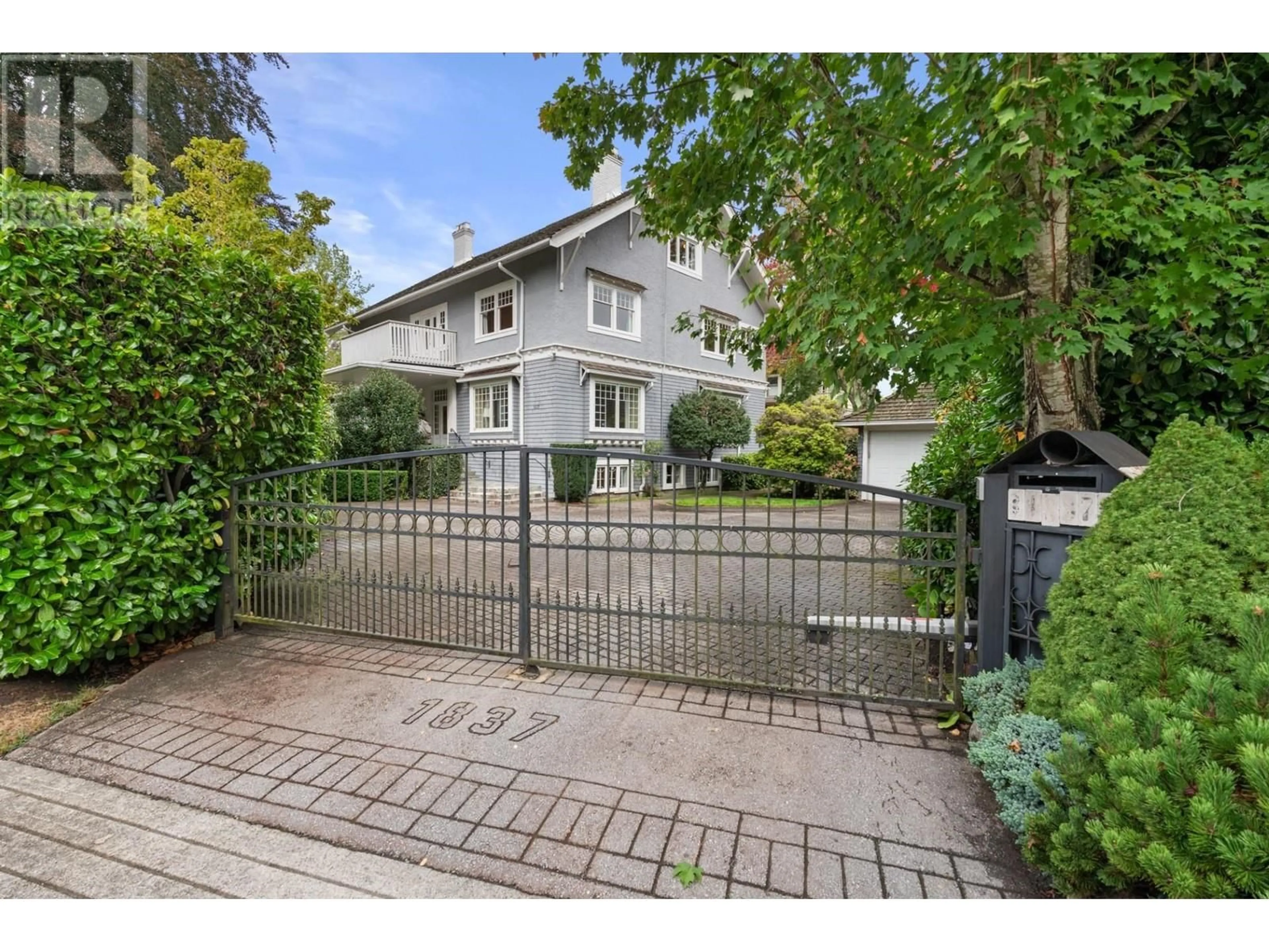 Frontside or backside of a home, the fenced backyard for 1837 MATTHEWS AVENUE, Vancouver British Columbia V6J2T4