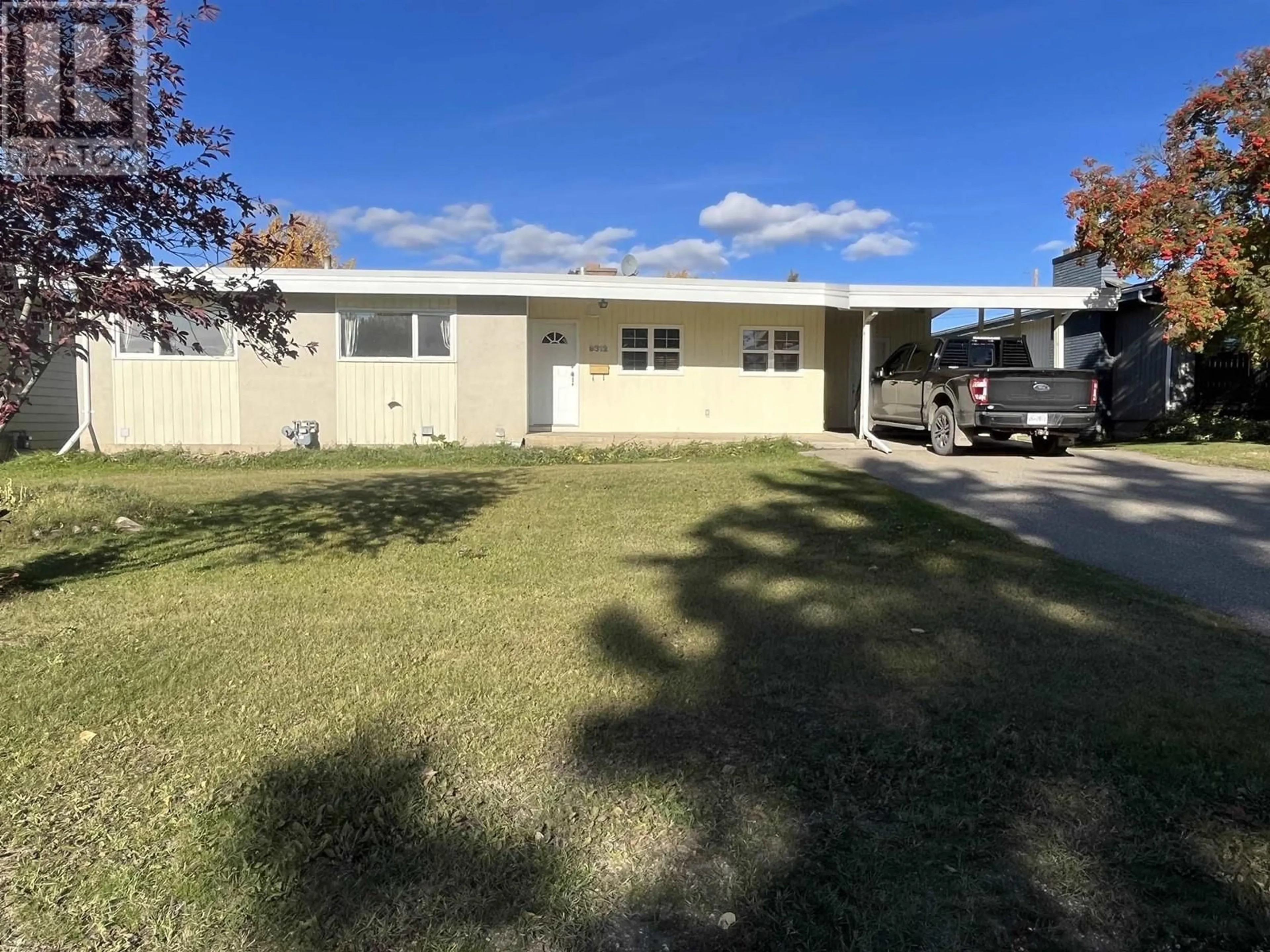 A pic from outside/outdoor area/front of a property/back of a property/a pic from drone, street for 9312 112 AVENUE, Fort St. John British Columbia V1J2V9