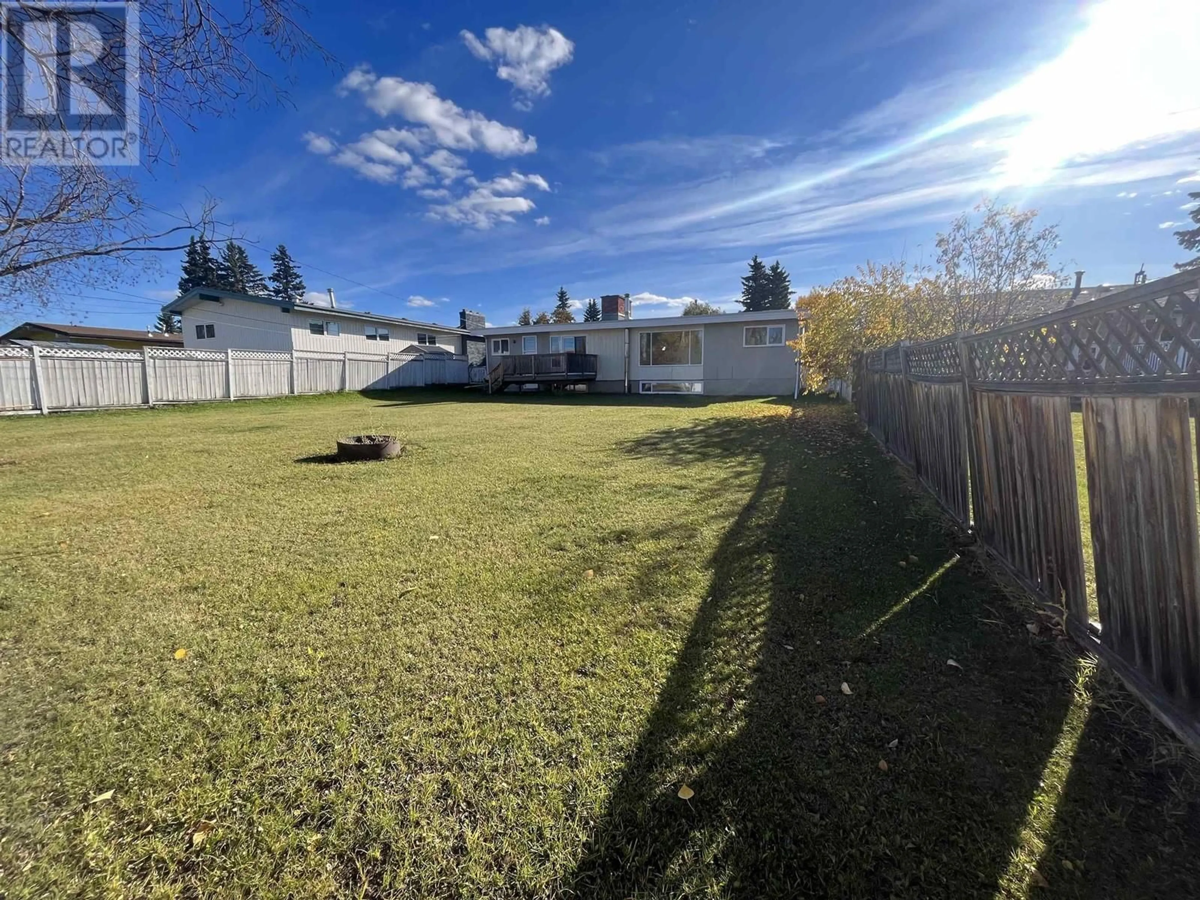 A pic from outside/outdoor area/front of a property/back of a property/a pic from drone, unknown for 9312 112 AVENUE, Fort St. John British Columbia V1J2V9