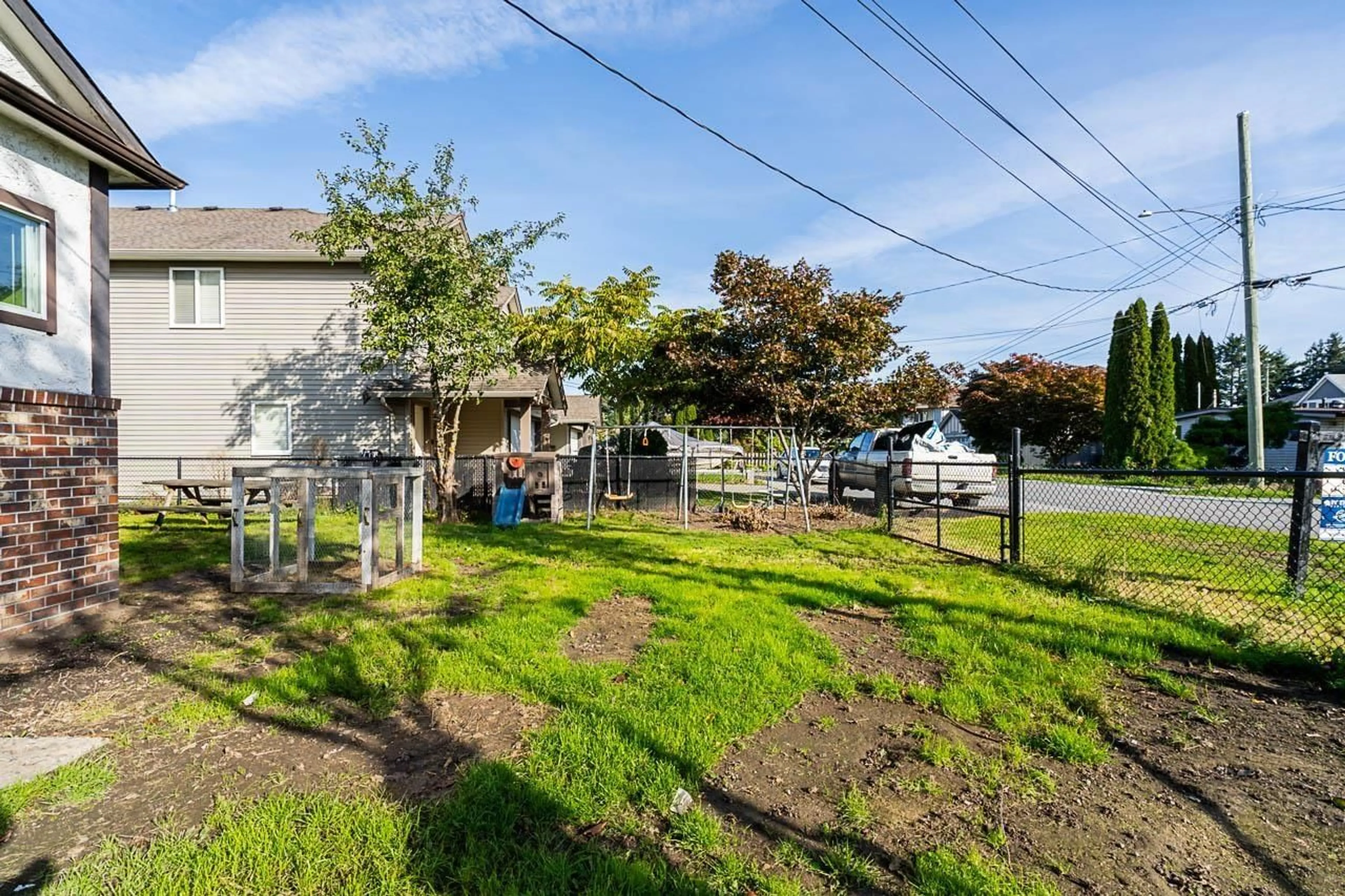 A pic from exterior of the house or condo, the fenced backyard for 9142 HIEBERT STREET, Chilliwack British Columbia V2P6C7