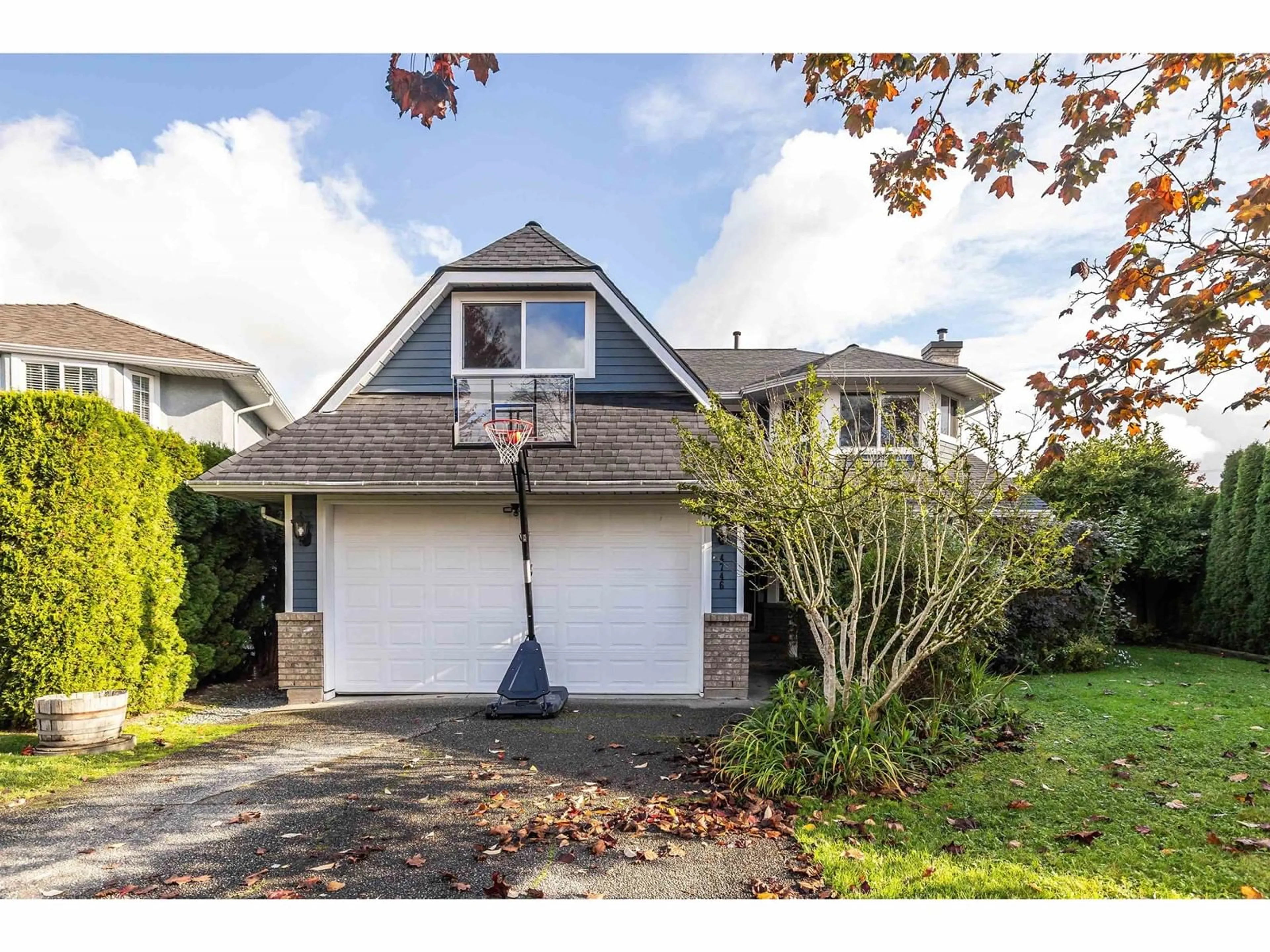 Frontside or backside of a home, the fenced backyard for 4746 215B STREET, Langley British Columbia V3A9E8