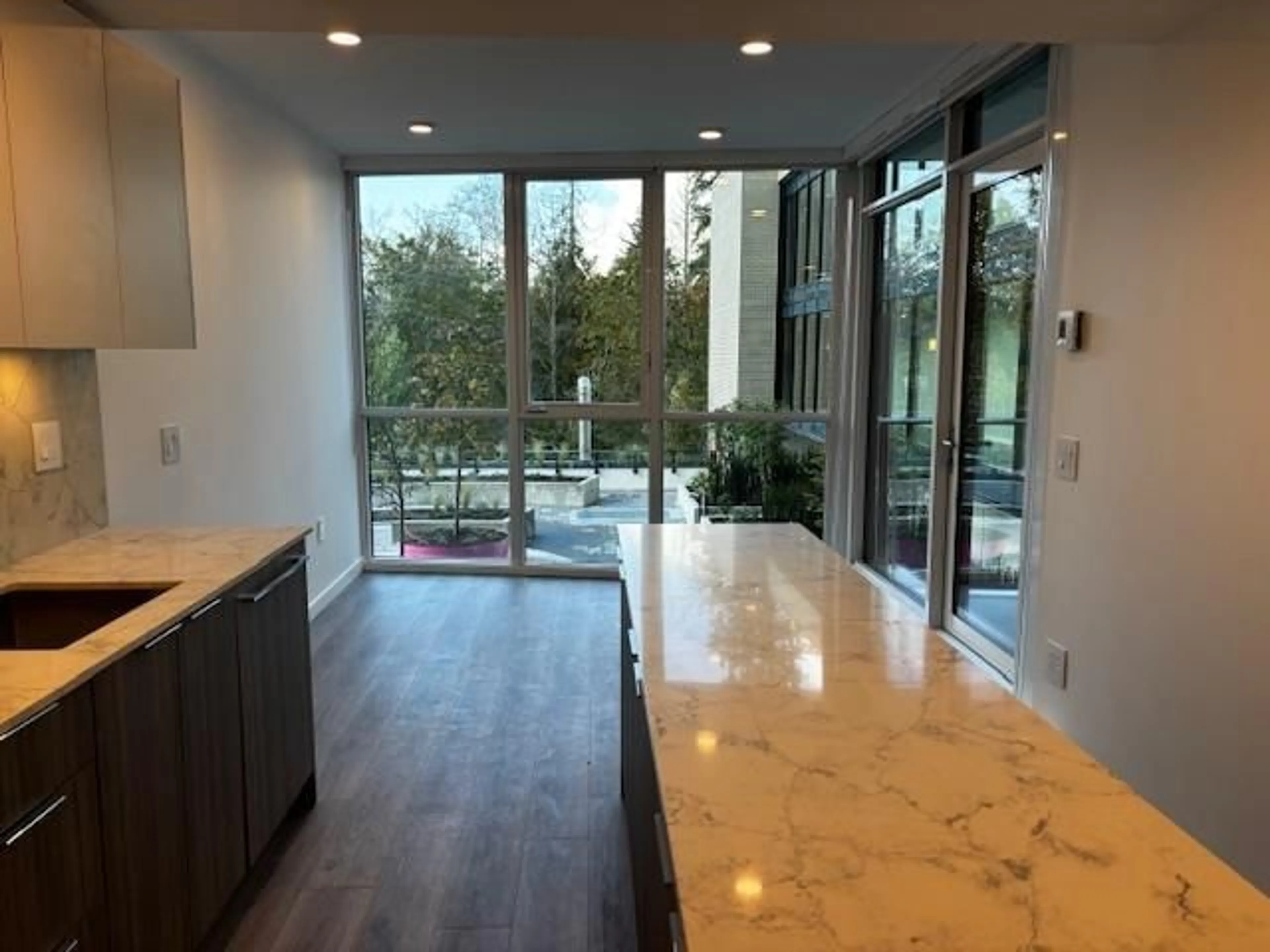 Open concept kitchen, ceramic/tile floor for 304 - 10333 133, Surrey British Columbia V0V0V0