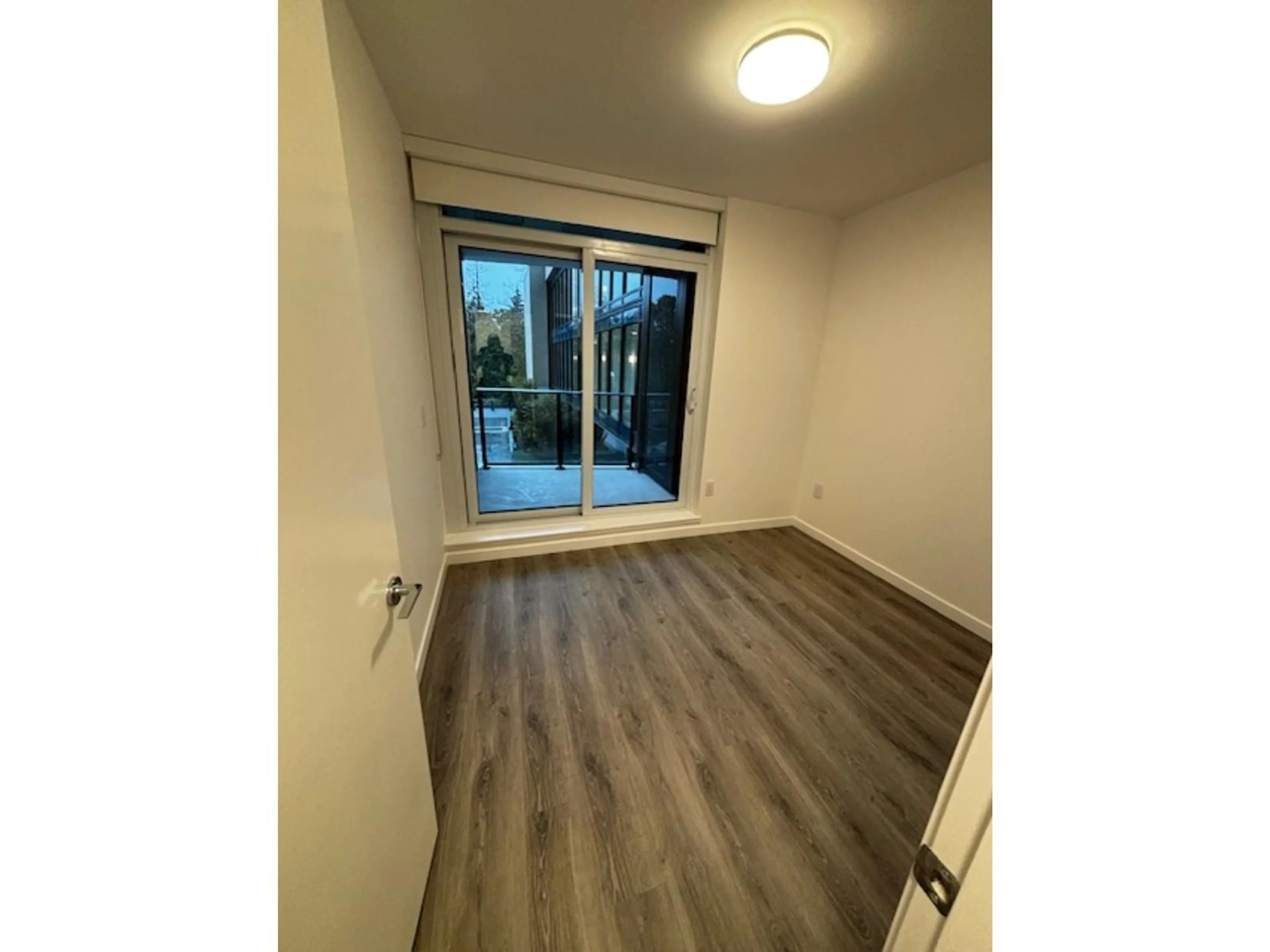 A pic of a room, wood floors for 304 10333 133 STREET, Surrey British Columbia V0V0V0