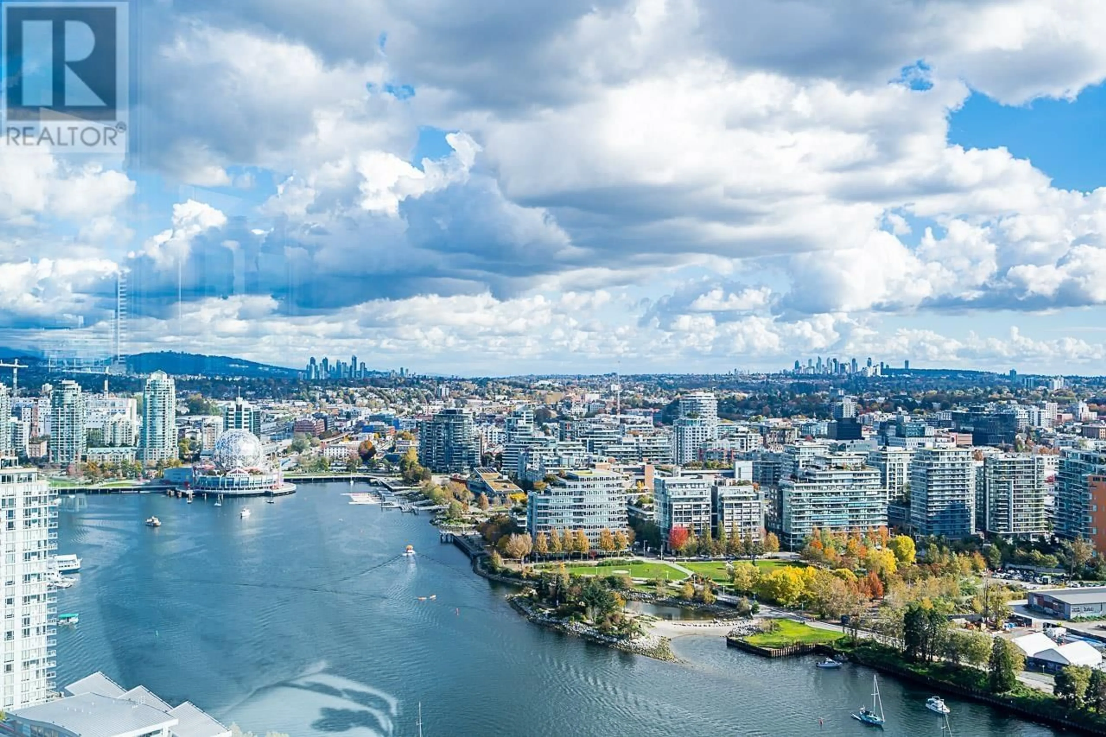 A pic from exterior of the house or condo, the view of city buildings for 3902 1033 MARINASIDE CRESCENT, Vancouver British Columbia V6Z3A3