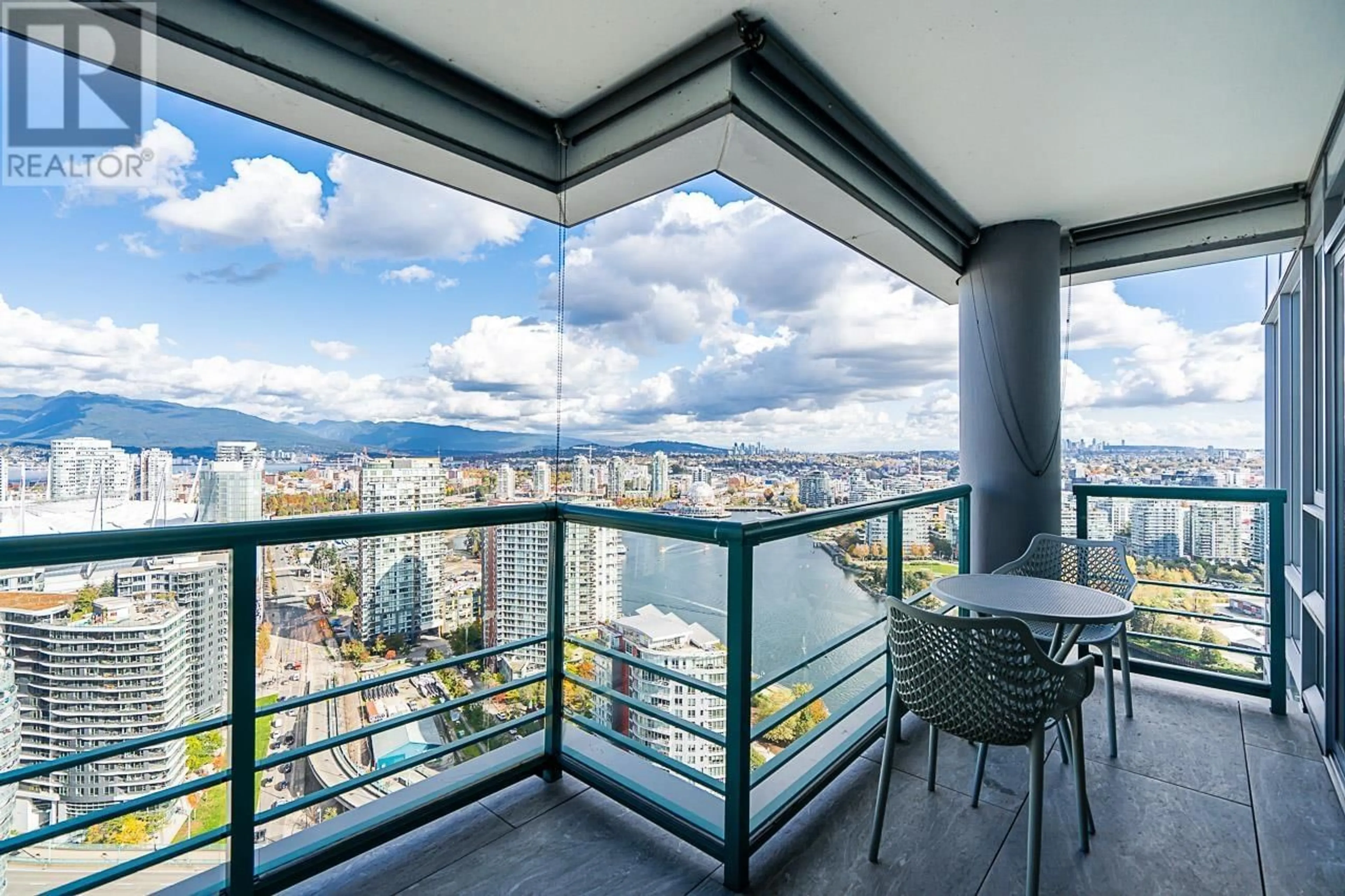 Balcony in the apartment, the view of city buildings for 3902 1033 MARINASIDE CRESCENT, Vancouver British Columbia V6Z3A3