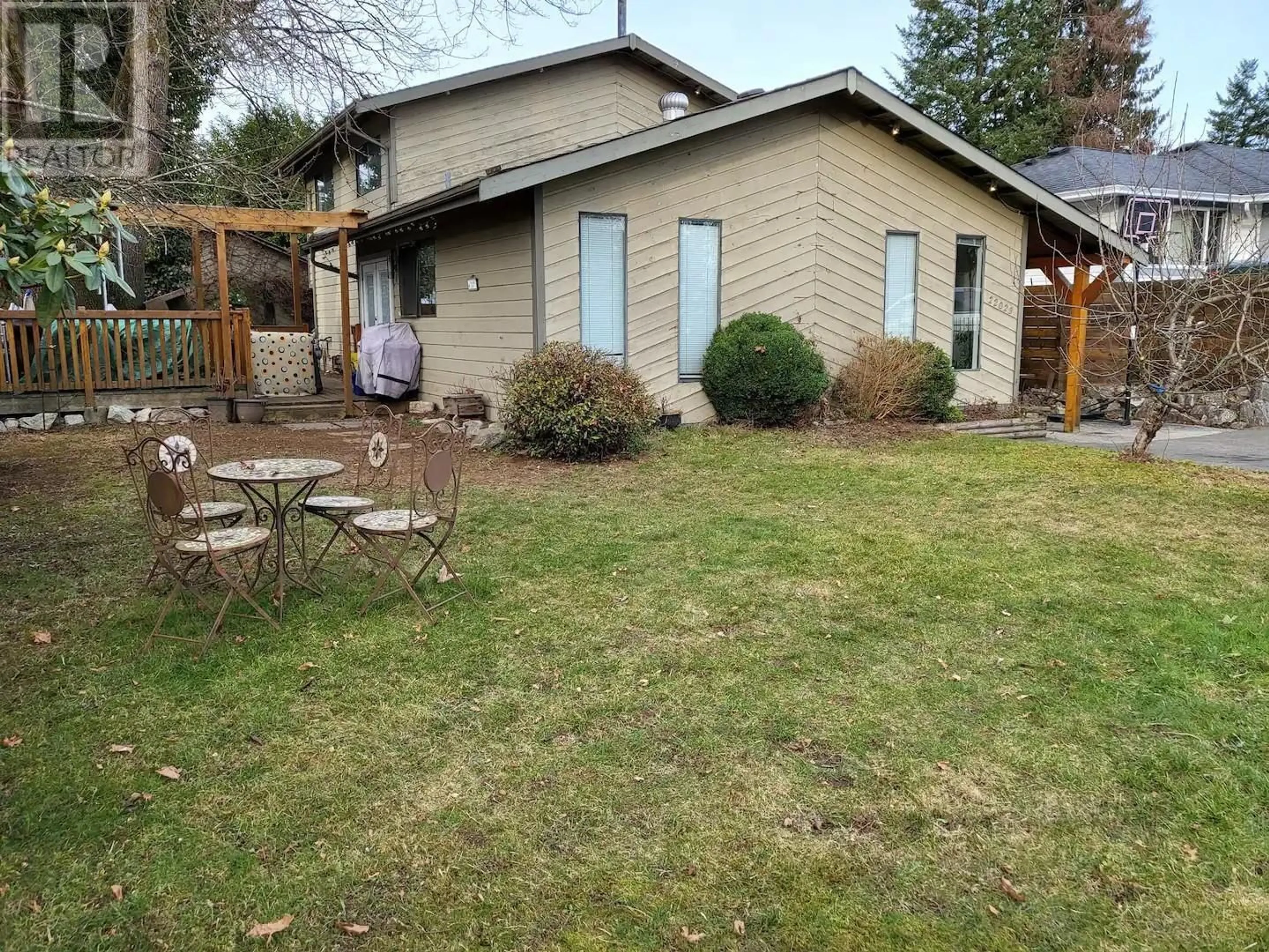 Frontside or backside of a home, the fenced backyard for 22023 SELKIRK AVENUE, Maple Ridge British Columbia V2X2W9