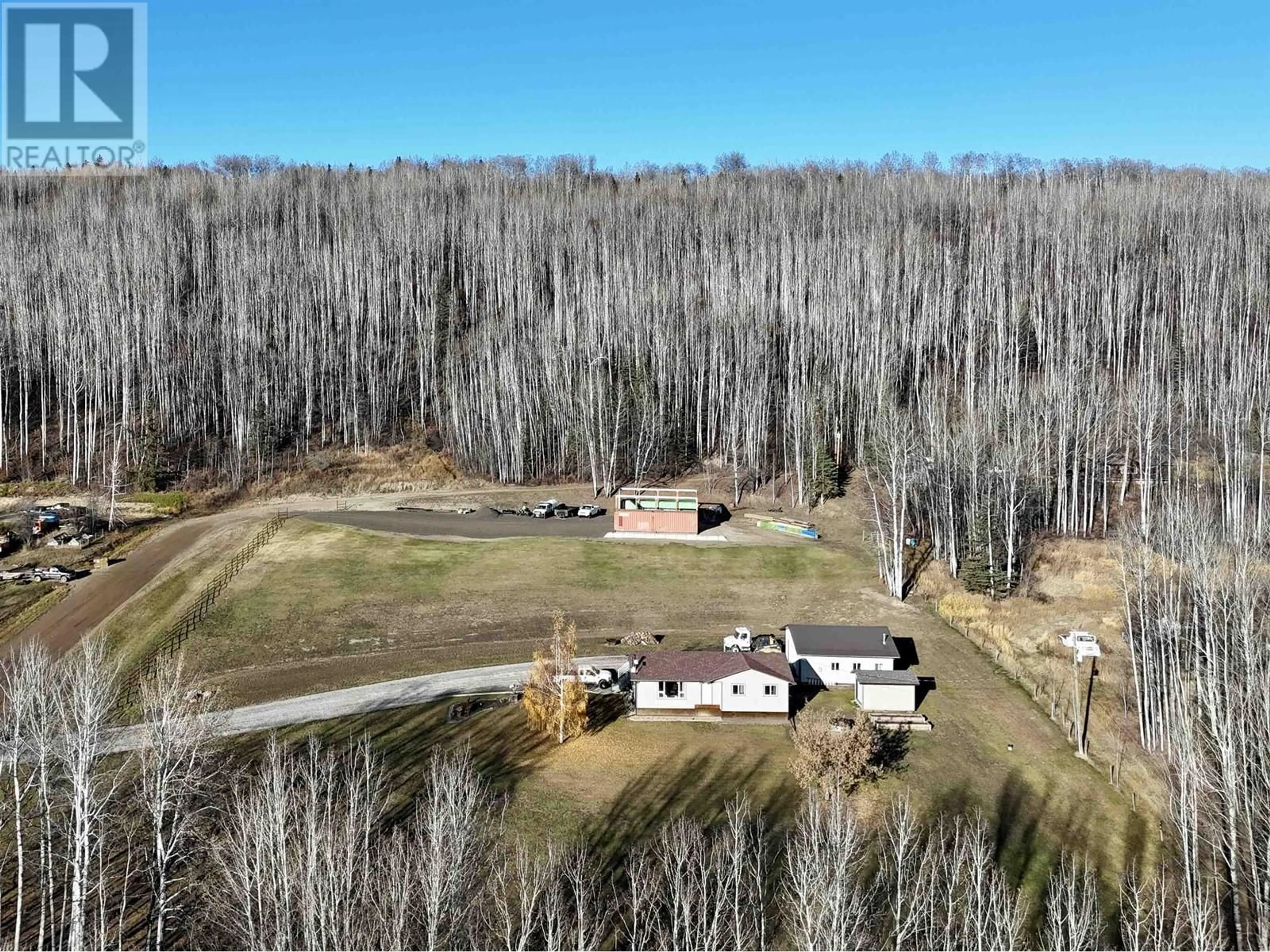 A pic from outside/outdoor area/front of a property/back of a property/a pic from drone, forest/trees view for 7608 OLD ALASKA HIGHWAY, Fort Nelson British Columbia V0C1R0