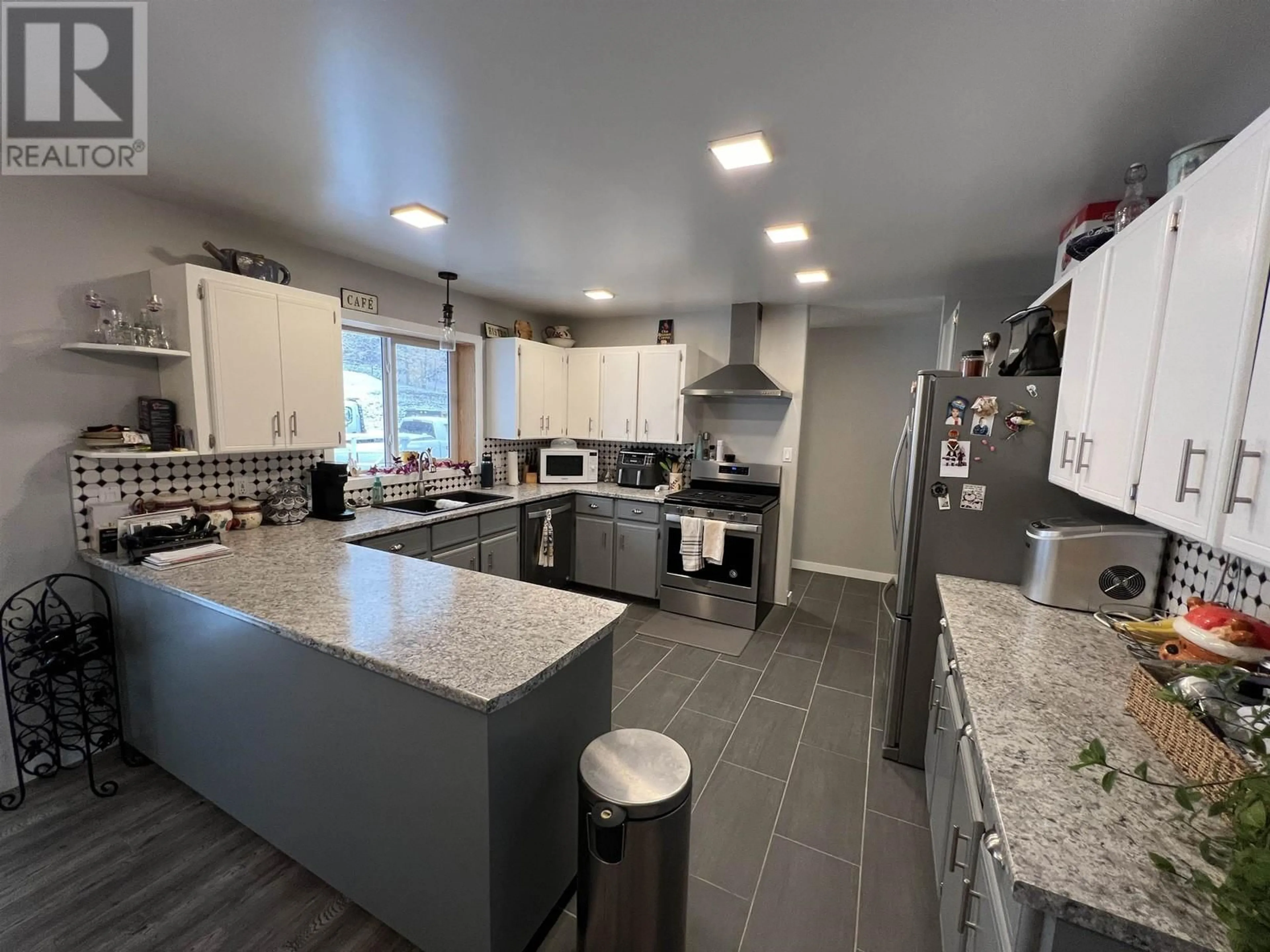 Open concept kitchen, ceramic/tile floor for 7608 OLD ALASKA HIGHWAY, Fort Nelson British Columbia V0C1R0