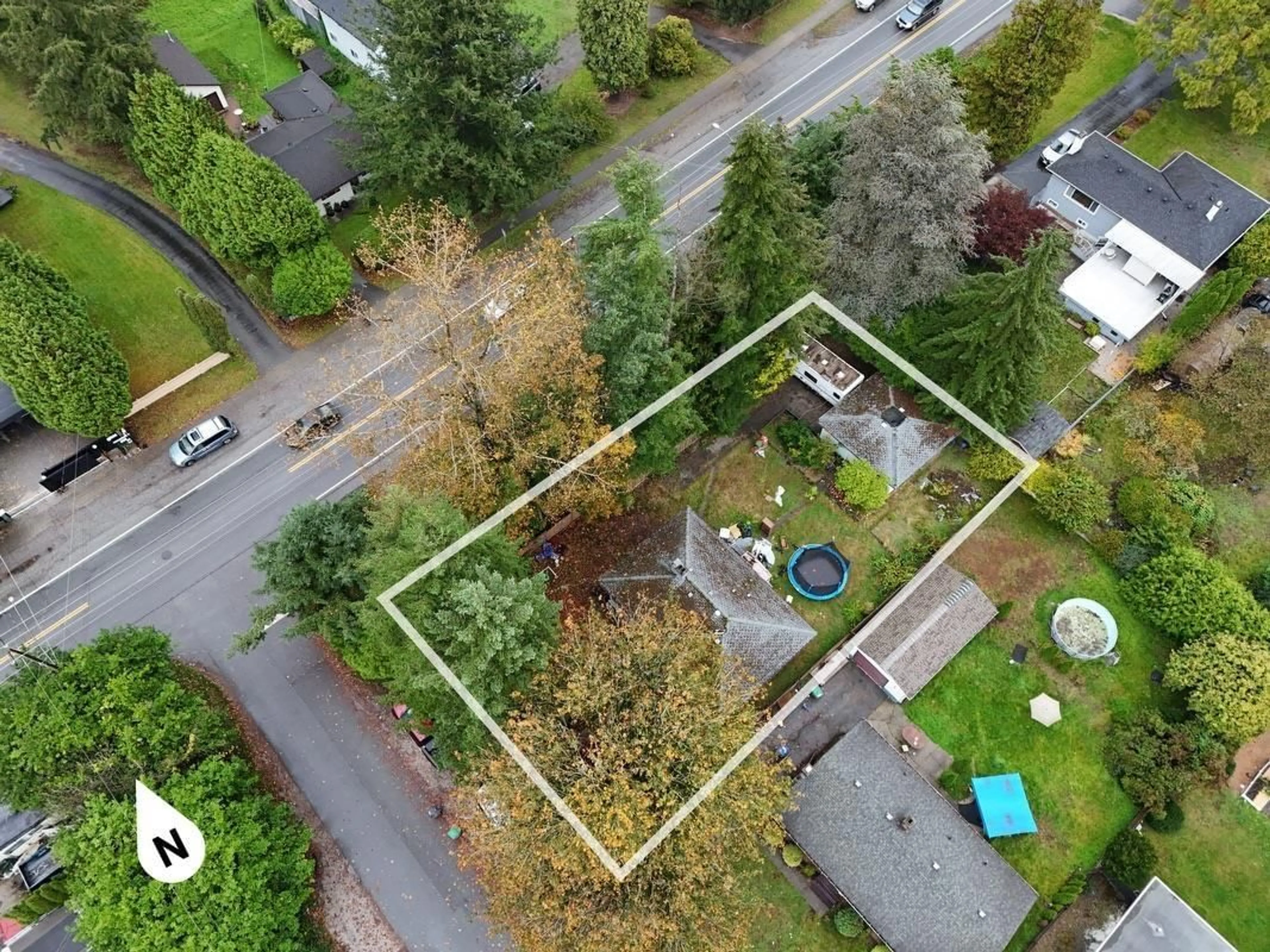 Frontside or backside of a home, the fenced backyard for 10386 126 STREET, Surrey British Columbia V3V5E9