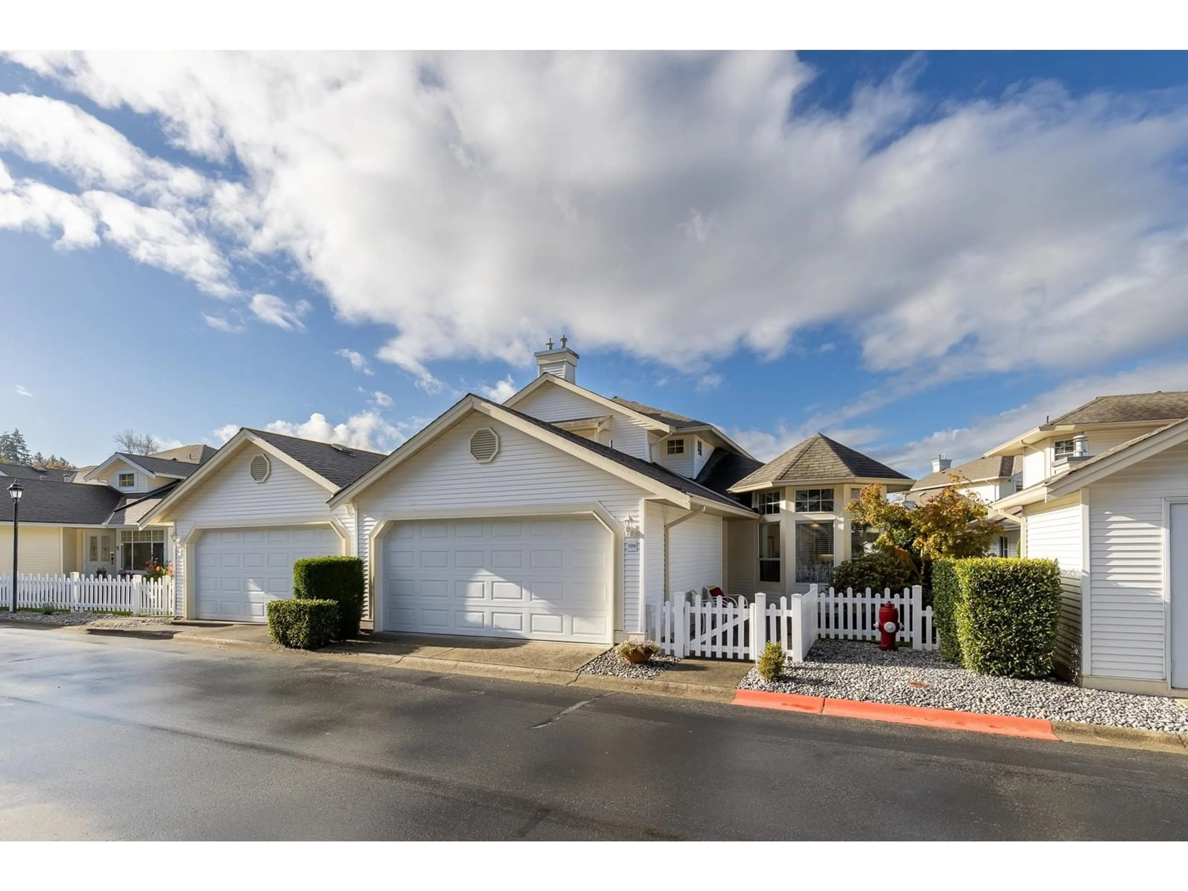 A pic from exterior of the house or condo, the street view for 109 9208 208 STREET, Langley British Columbia V1M2M9