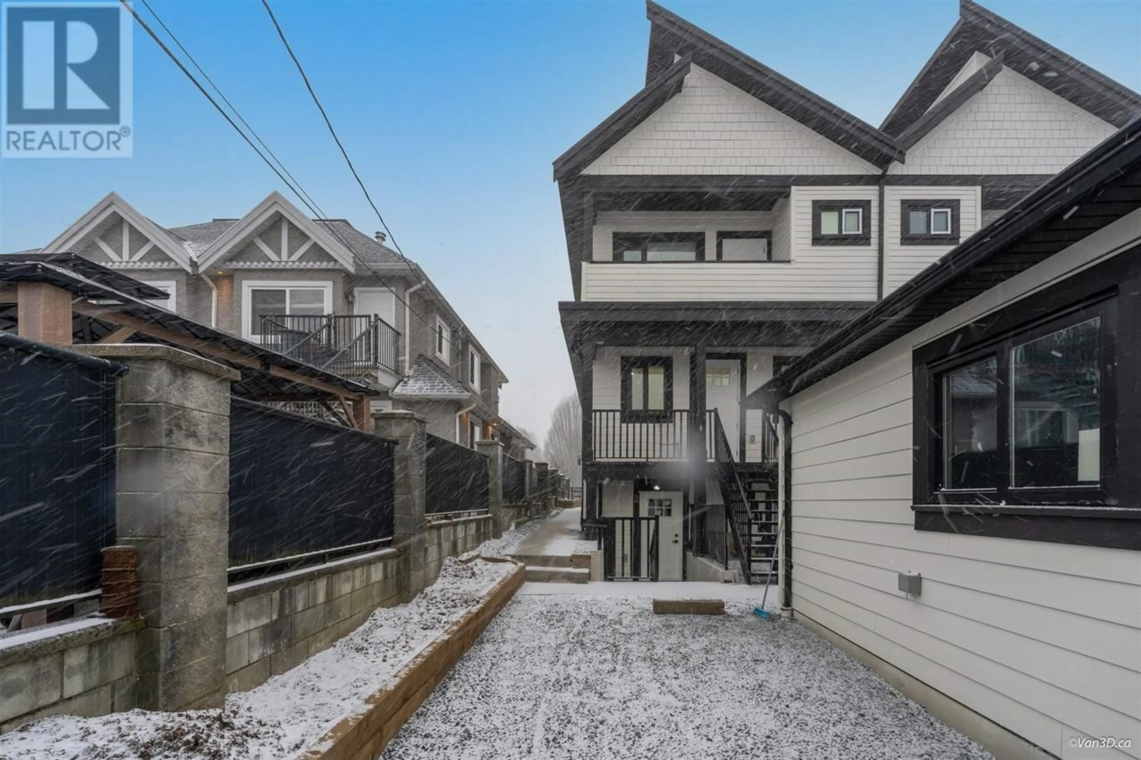 A pic from exterior of the house or condo, the fenced backyard for 5470 CLARENDON STREET, Vancouver British Columbia V5R3K4