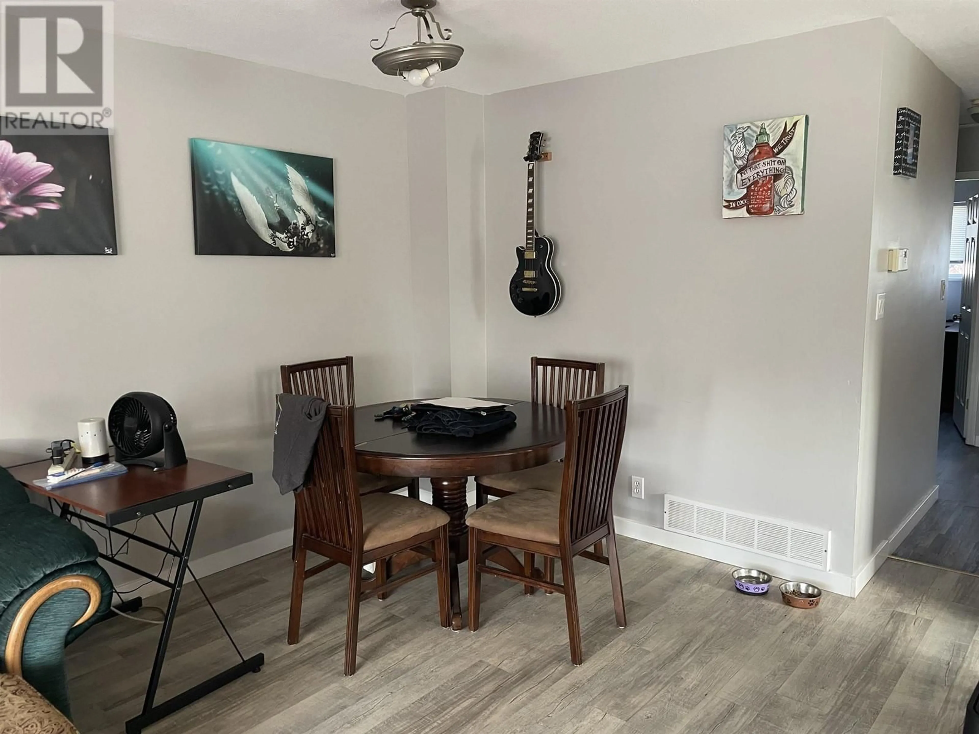 Dining room, wood floors, cottage for A 10307 90 STREET, Fort St. John British Columbia V1J6S6