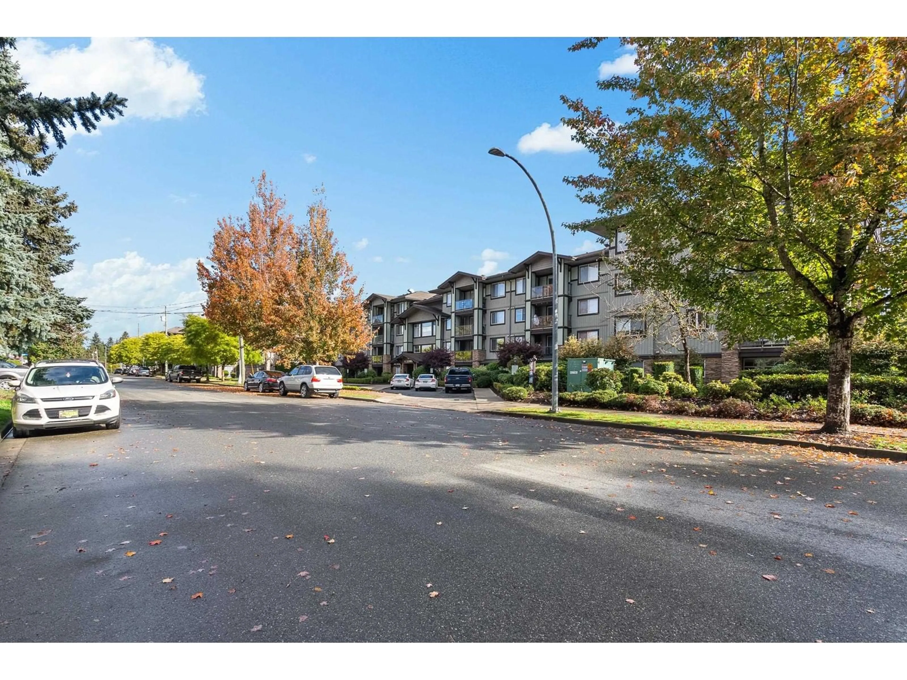 A pic from exterior of the house or condo, the street view for 305 2038 SANDALWOOD CRESCENT, Abbotsford British Columbia V2S3H6