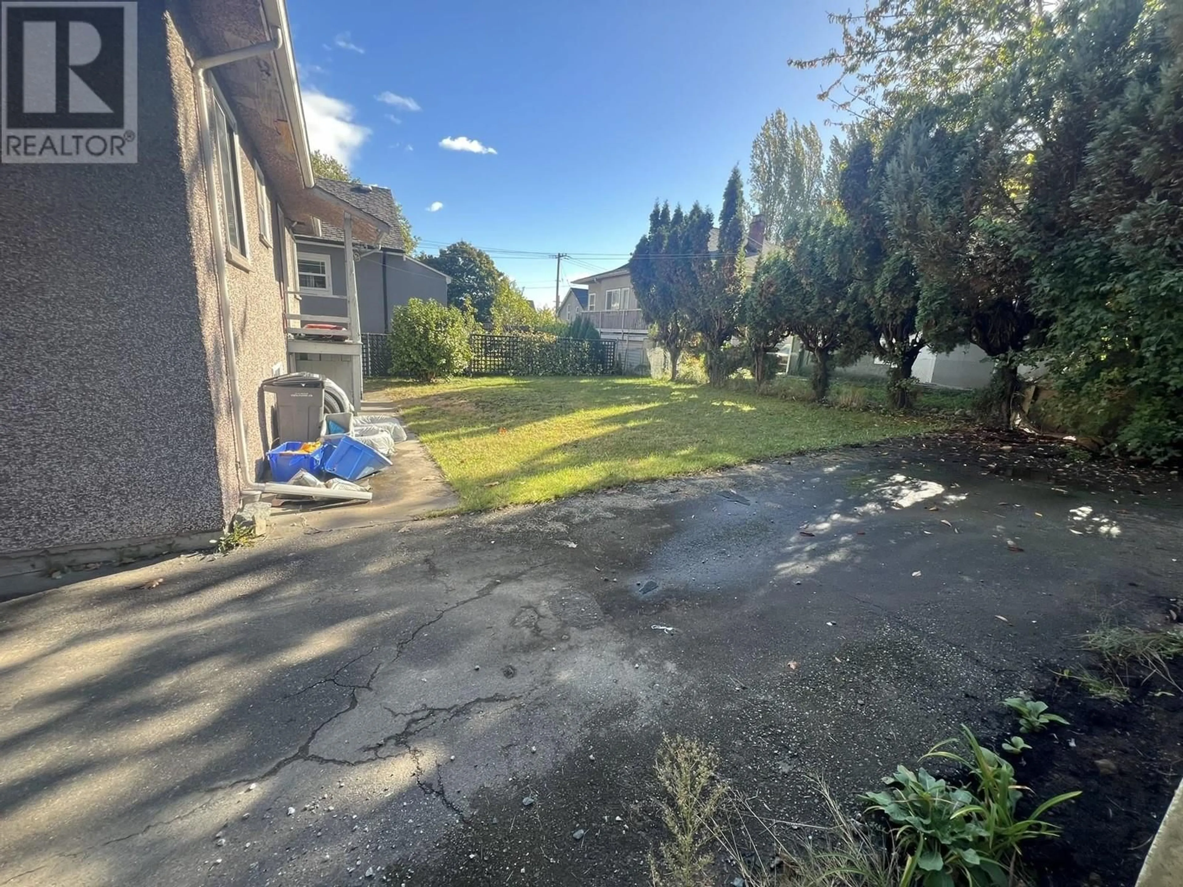 Frontside or backside of a home, the fenced backyard for 360 E 24TH AVENUE, Vancouver British Columbia V5V1Z9