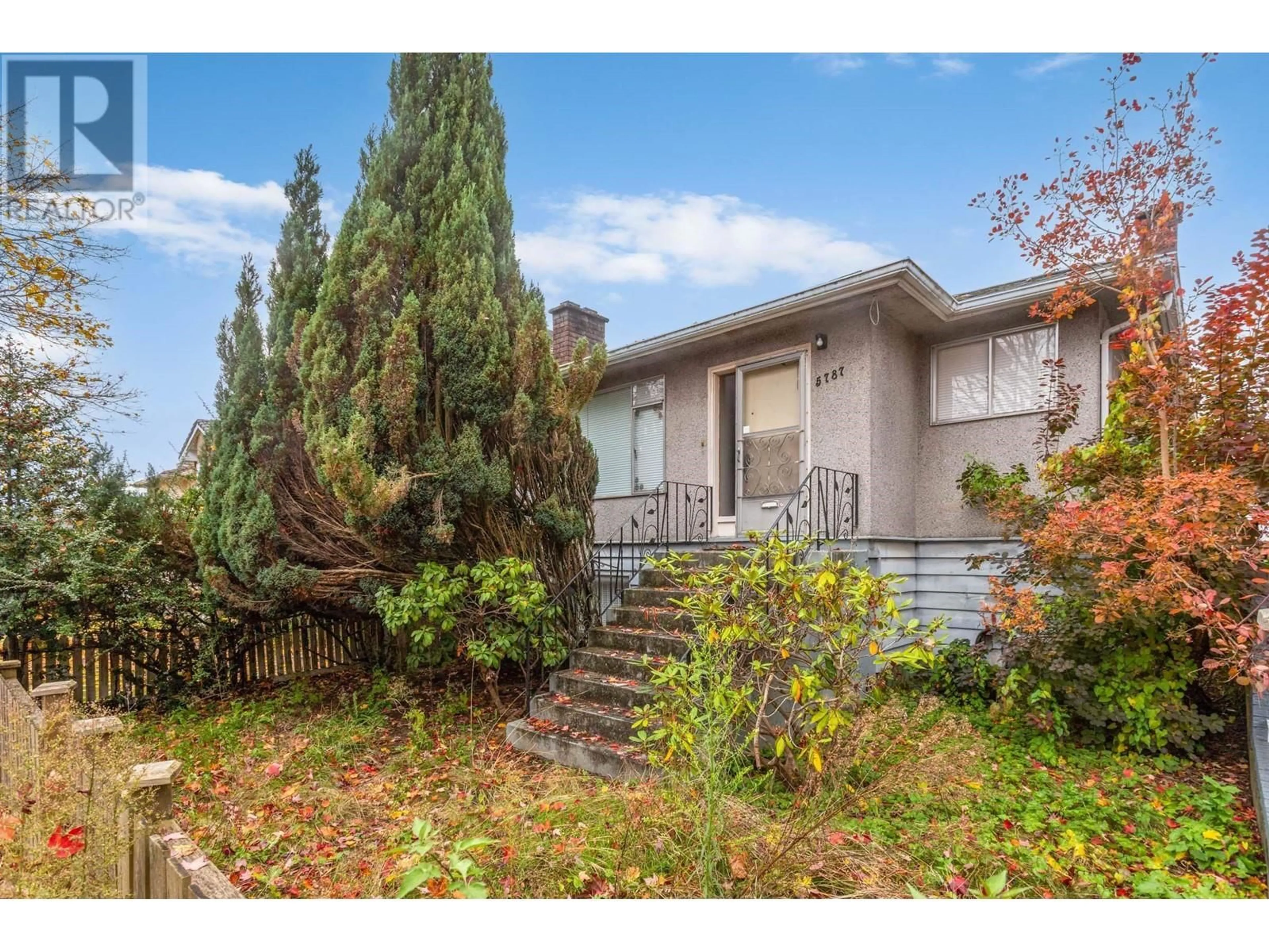 Frontside or backside of a home, the fenced backyard for 5787 ST. MARGARETS STREET, Vancouver British Columbia V5R3H6