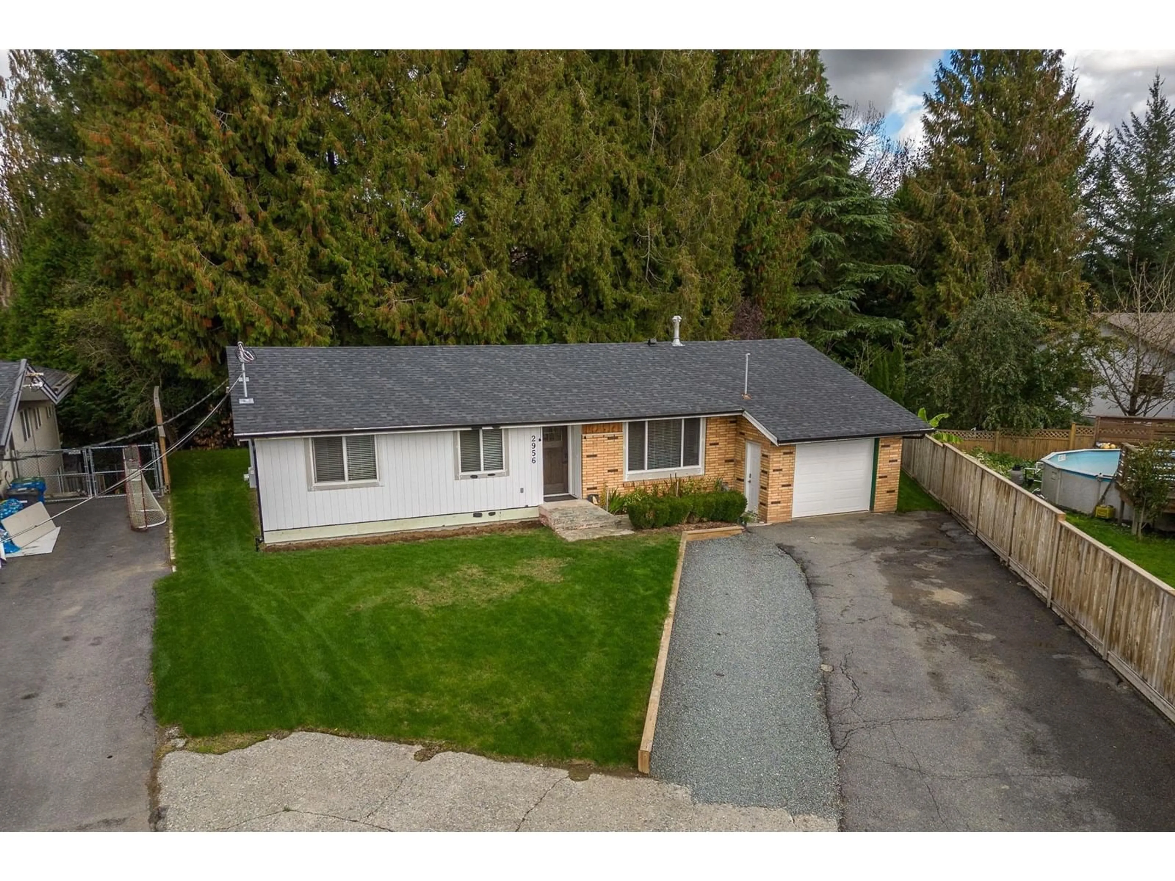 Frontside or backside of a home, the fenced backyard for 2956 AURORA PLACE, Abbotsford British Columbia V2S3L5