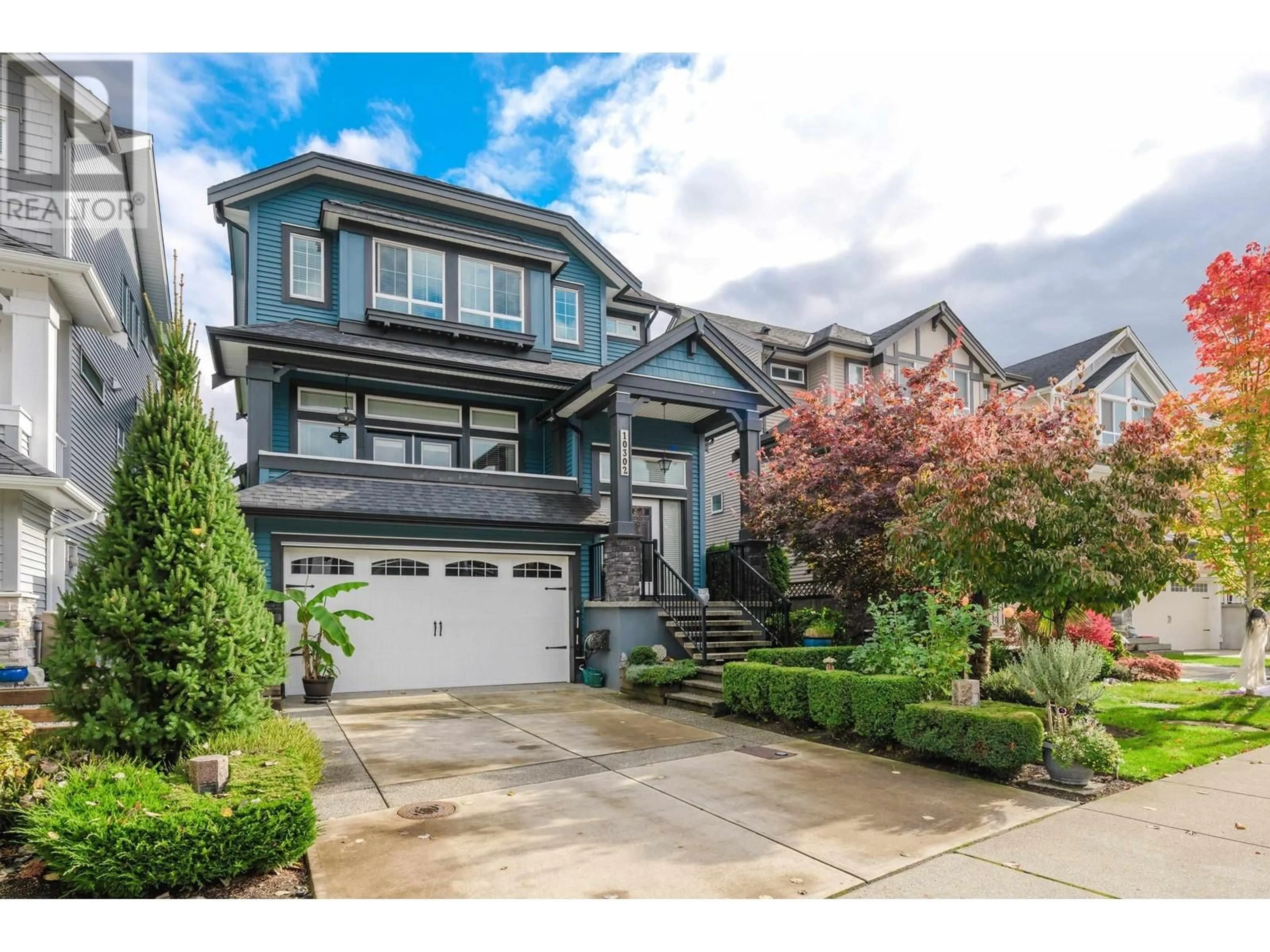 Frontside or backside of a home, the street view for 10302 WYNNYK WAY, Maple Ridge British Columbia V2W1G3