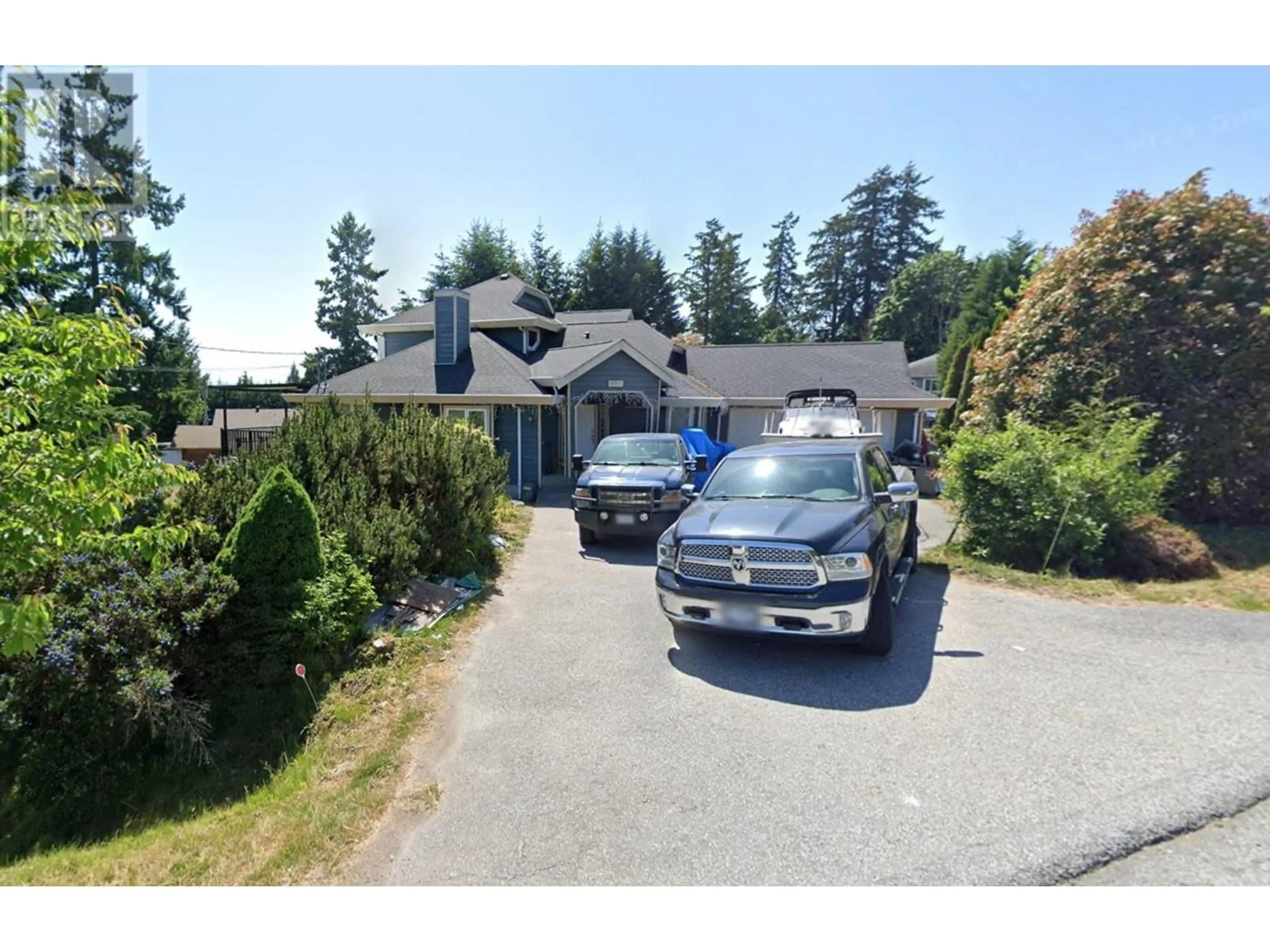 Frontside or backside of a home, the street view for 6181 BAILLIE ROAD, Sechelt British Columbia V7Z0M2