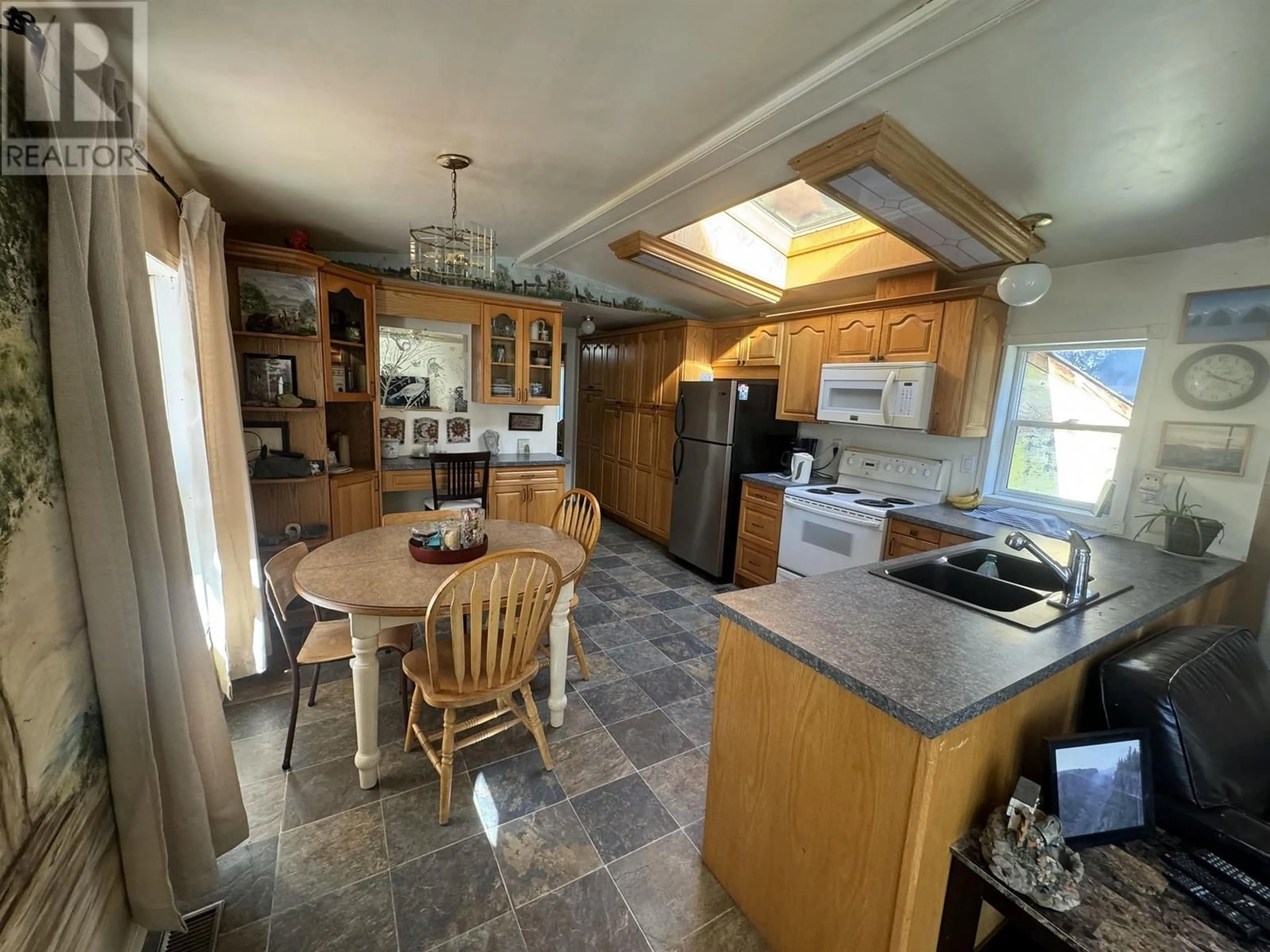 Kitchen, wood floors, cottage for 3009 GLEASON CRESCENT, Williams Lake British Columbia V0L1G0