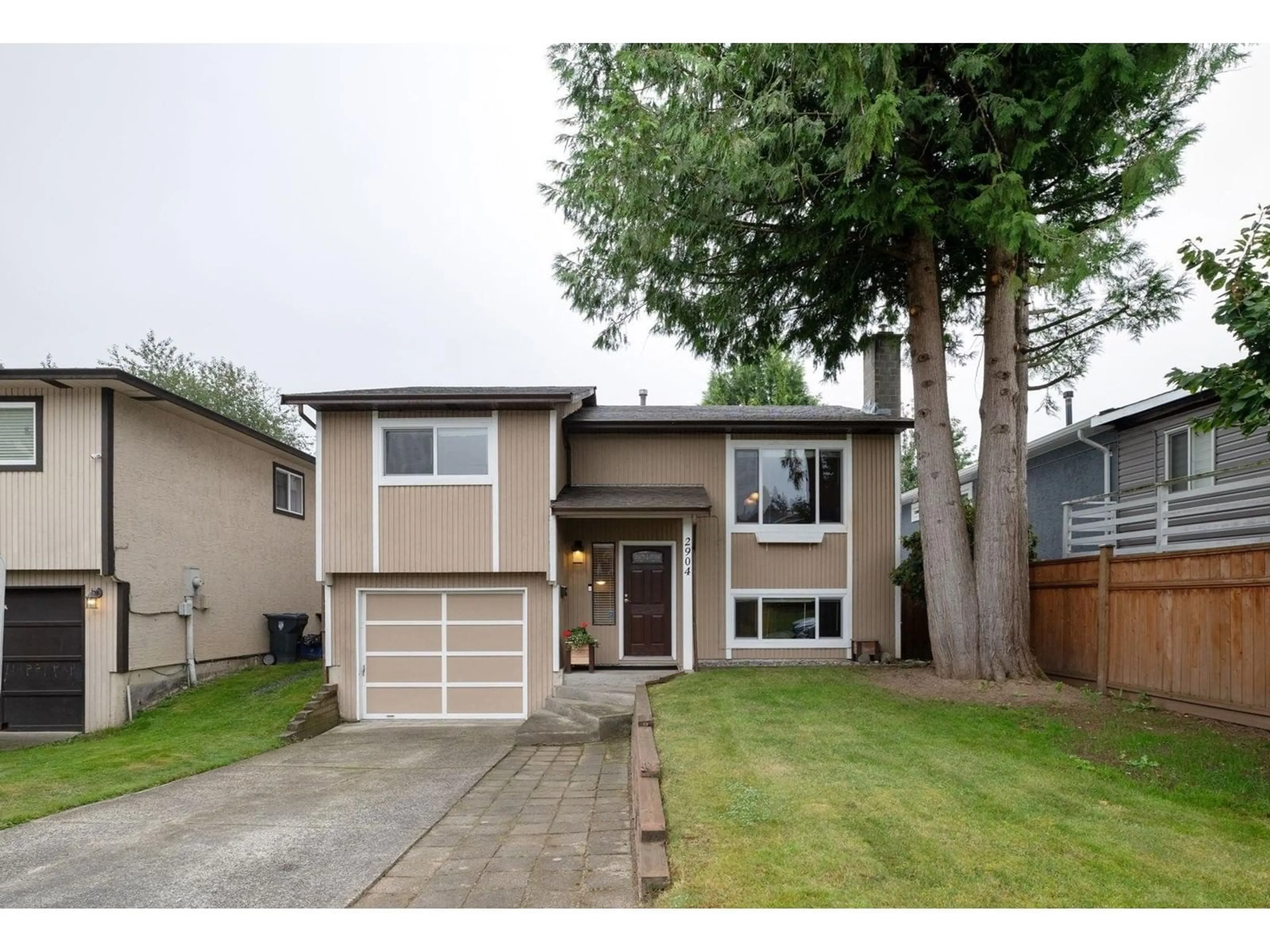 Frontside or backside of a home, the fenced backyard for 2904 WIGGINS PLACE, Langley British Columbia V2Y1E9