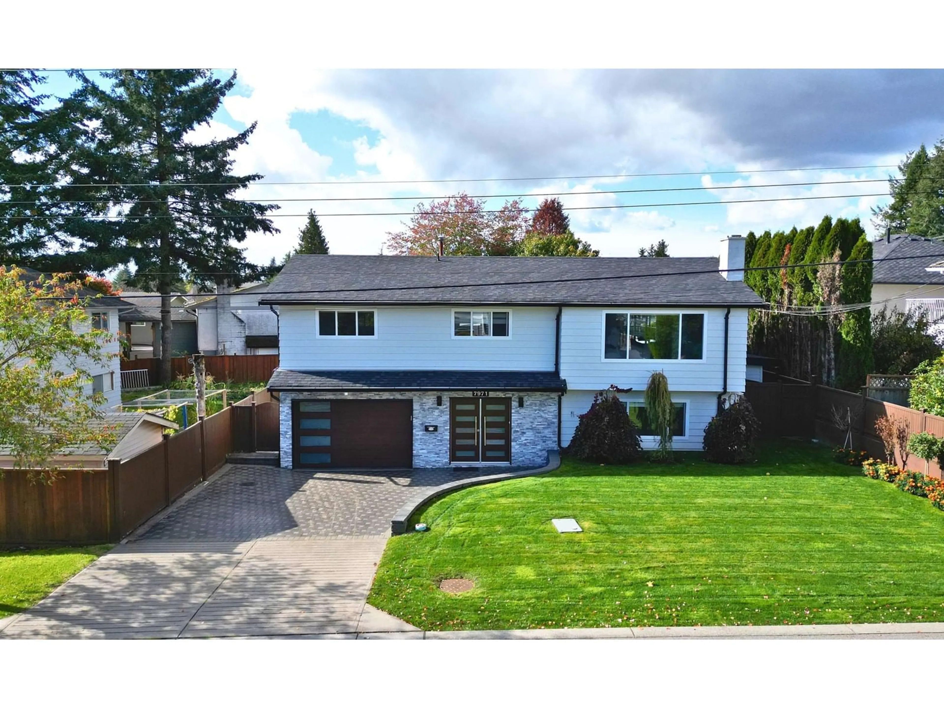 Frontside or backside of a home, the fenced backyard for 7971 115 STREET, Delta British Columbia V4C7B2