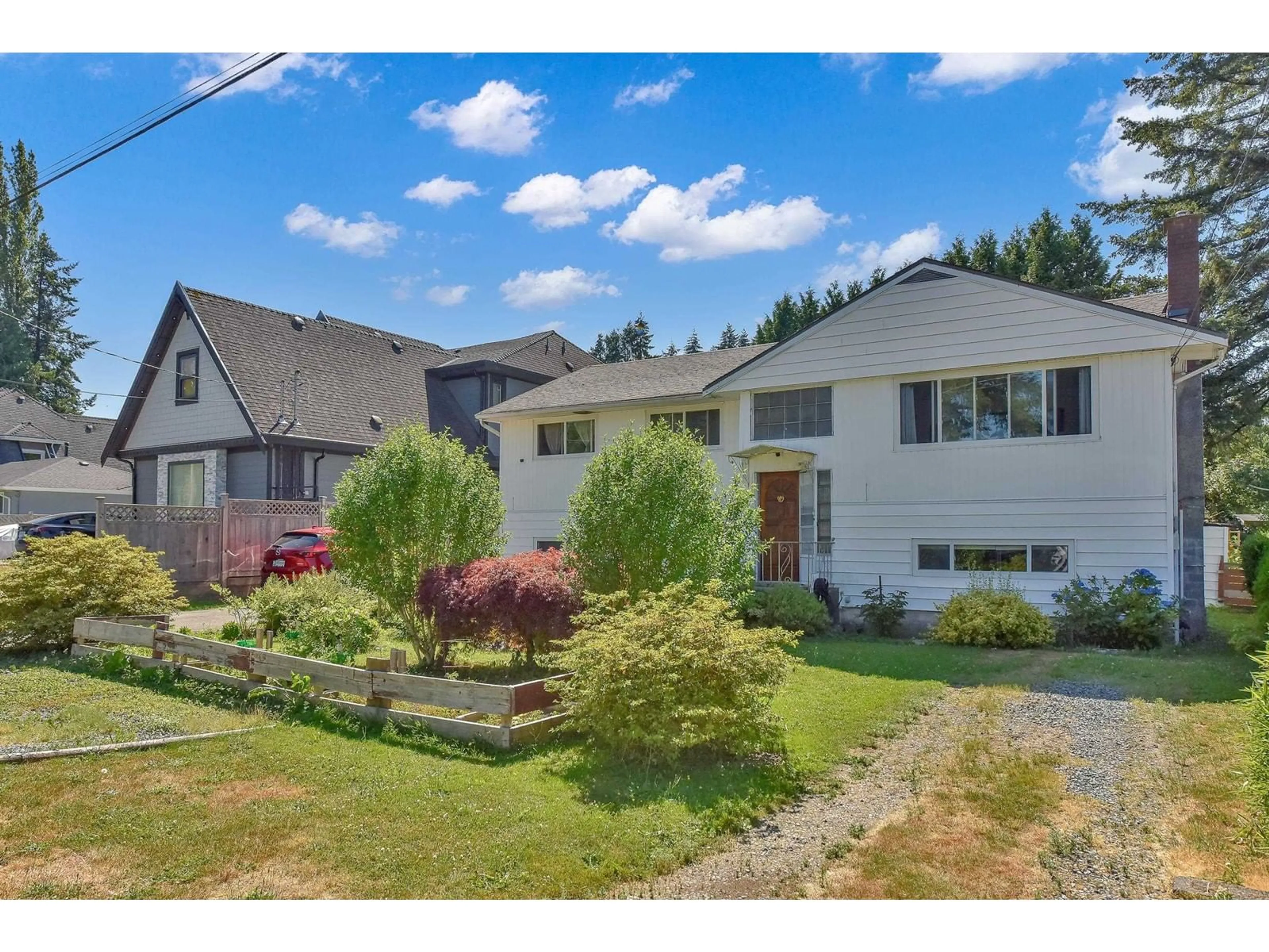 Frontside or backside of a home, the fenced backyard for 11059 146A STREET, Surrey British Columbia V3R3V3