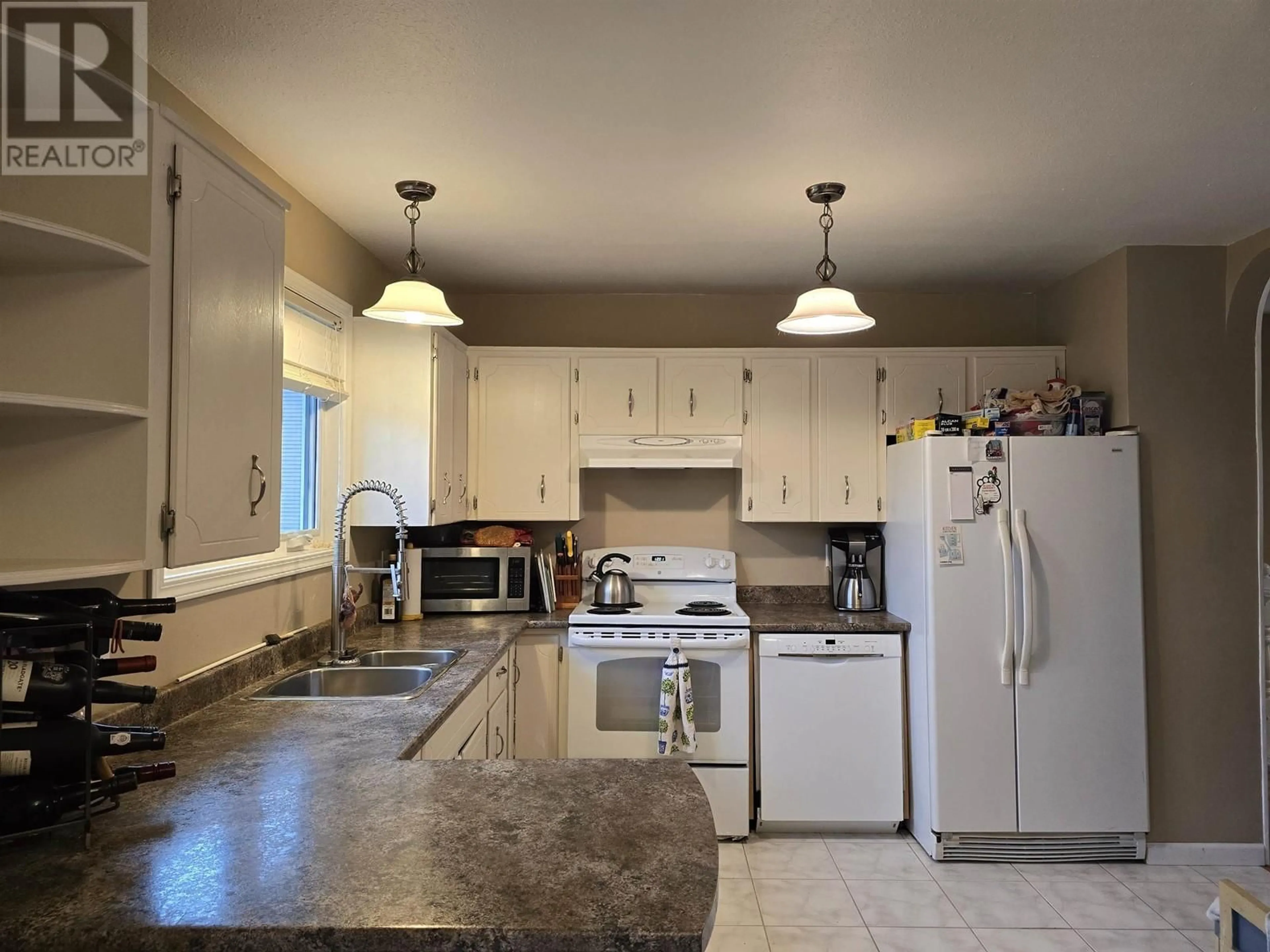 Standard kitchen, wood floors, cottage for 131 DUNCAN PLACE, Prince George British Columbia V2M6T4