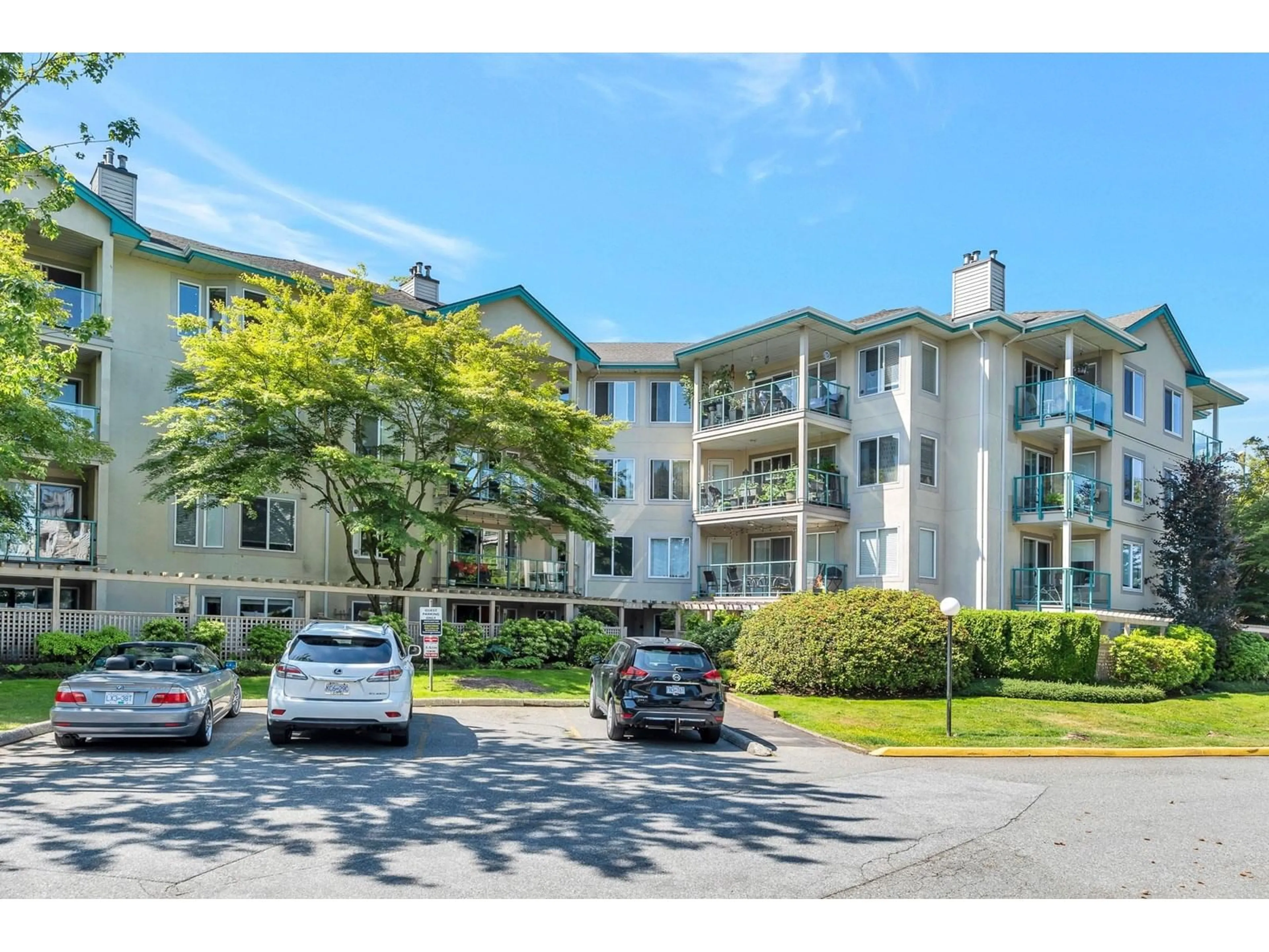 A pic from exterior of the house or condo, the street view for 403 20433 53 AVENUE, Langley British Columbia V3A7A6