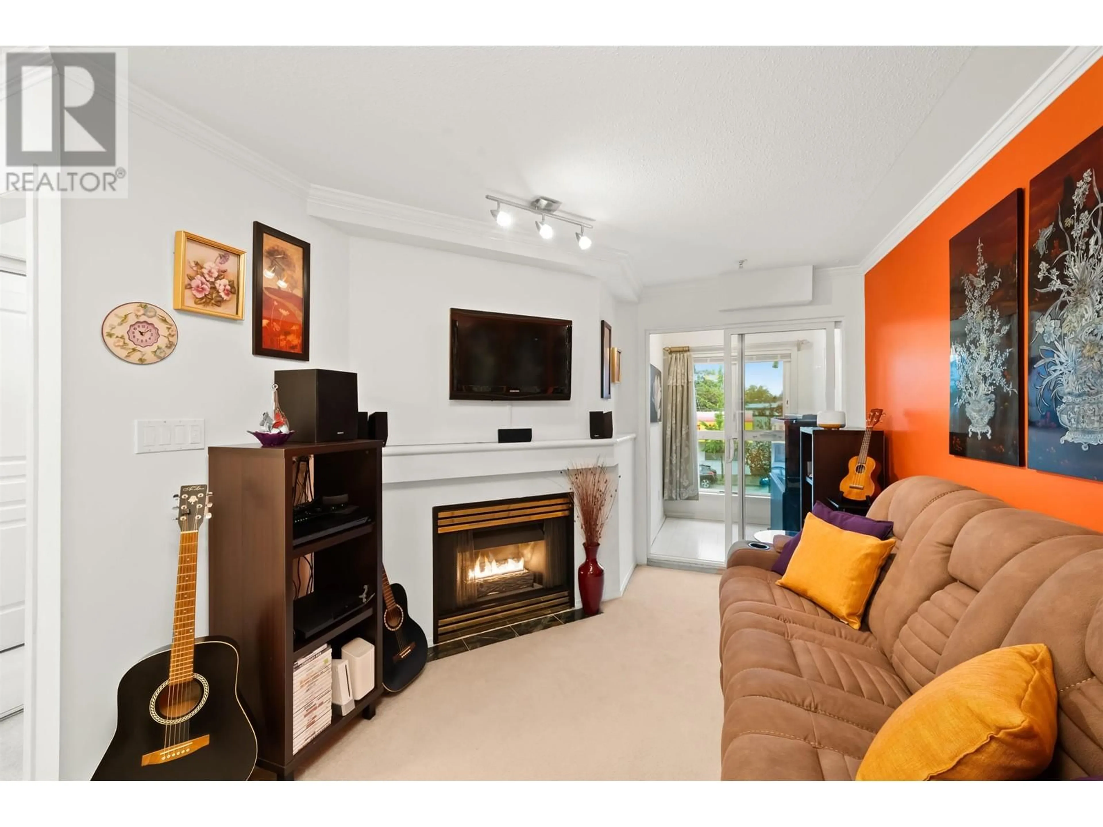 Living room, wood floors for 208 4989 DUCHESS STREET, Vancouver British Columbia V5R6E5