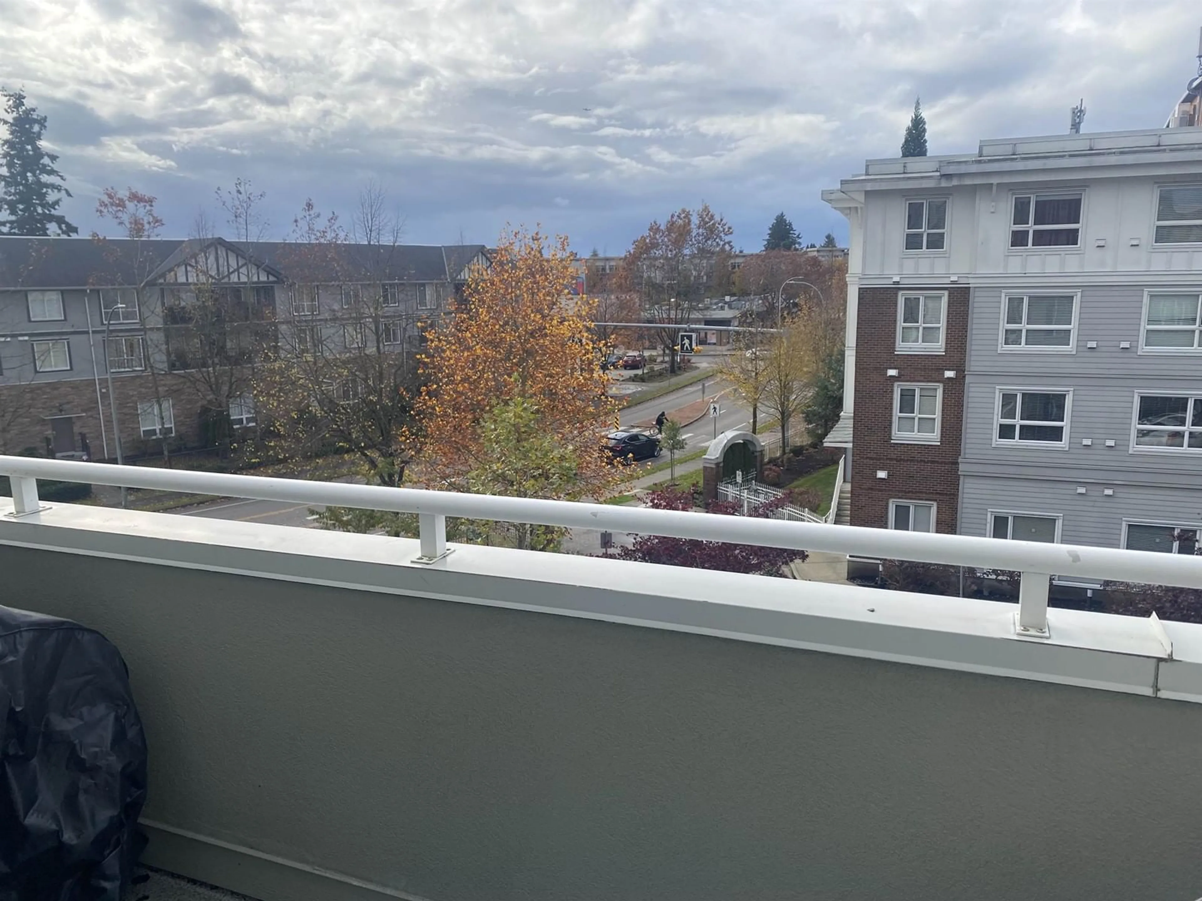 Balcony in the apartment, city buildings view from balcony for 412 - 12125 75A, Surrey British Columbia V3W1B9