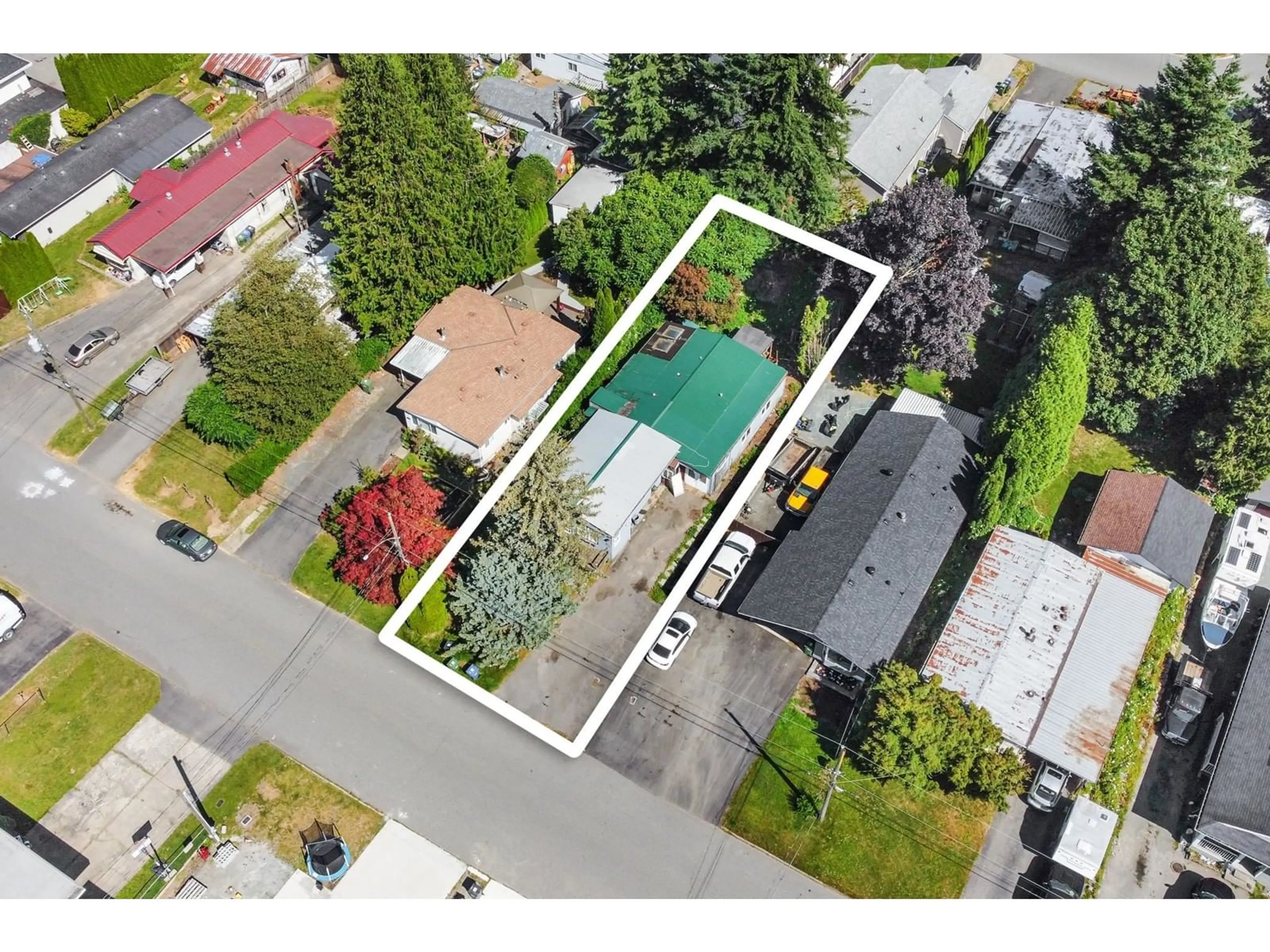 Frontside or backside of a home, the fenced backyard for 31543 LOMBARD AVENUE, Abbotsford British Columbia V2T6M6