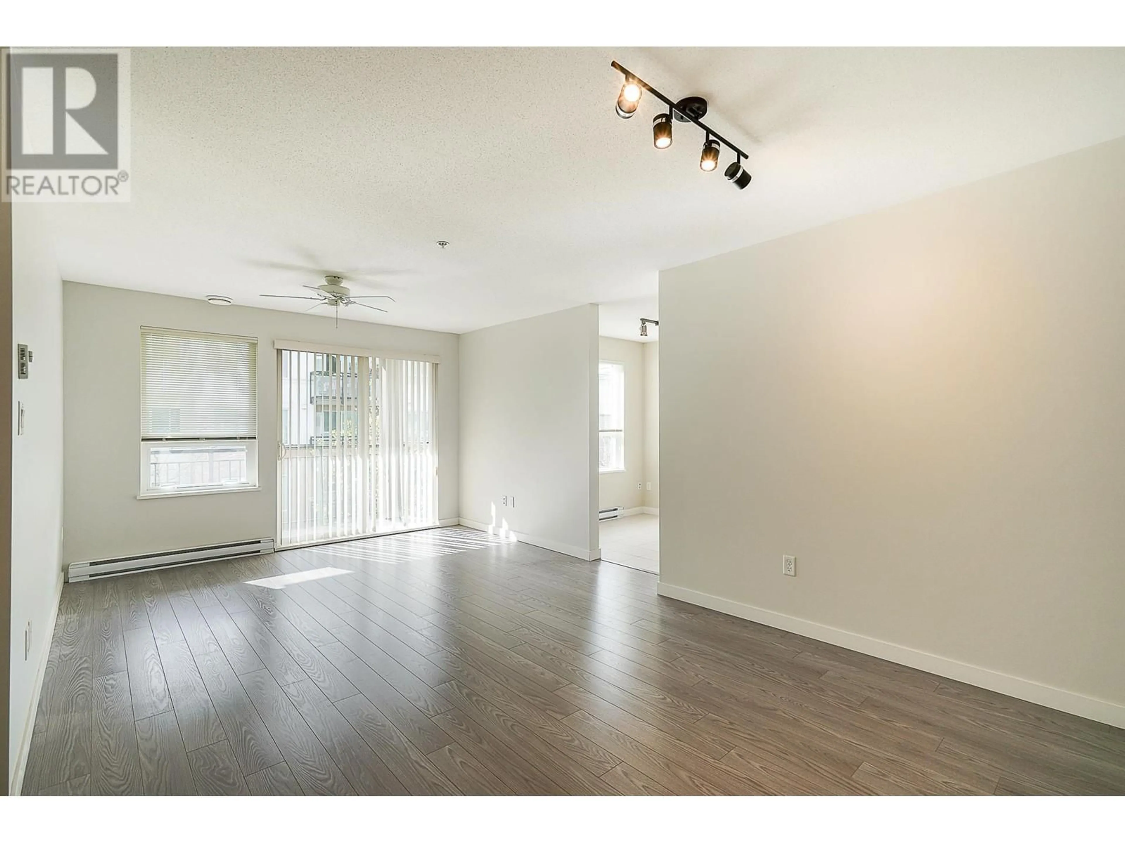 A pic of a room, wood floors for 321 9399 TOMICKI AVENUE, Richmond British Columbia V6X0H6