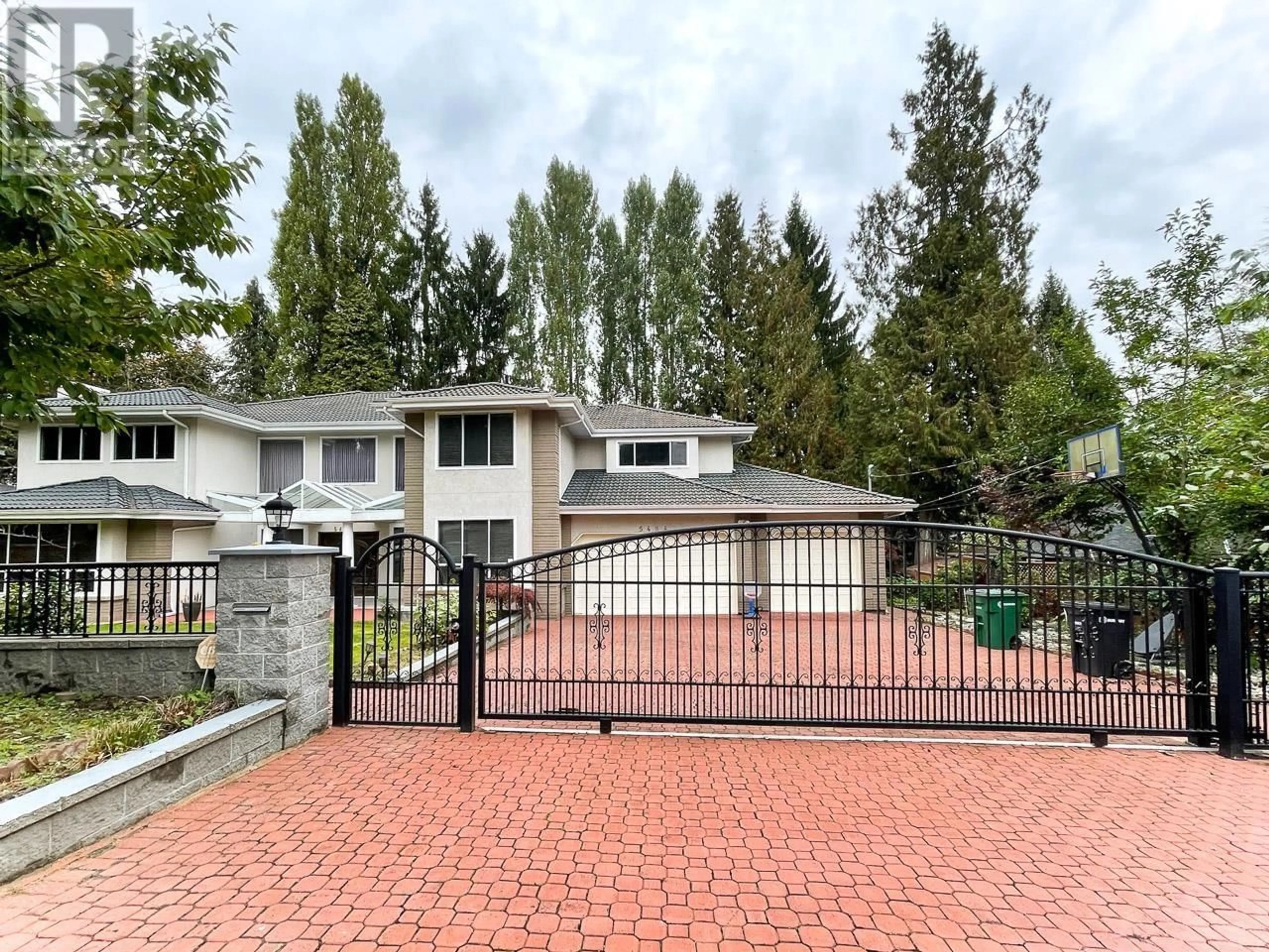 Frontside or backside of a home, the fenced backyard for 5484 RUGBY STREET, Burnaby British Columbia V5E2N1