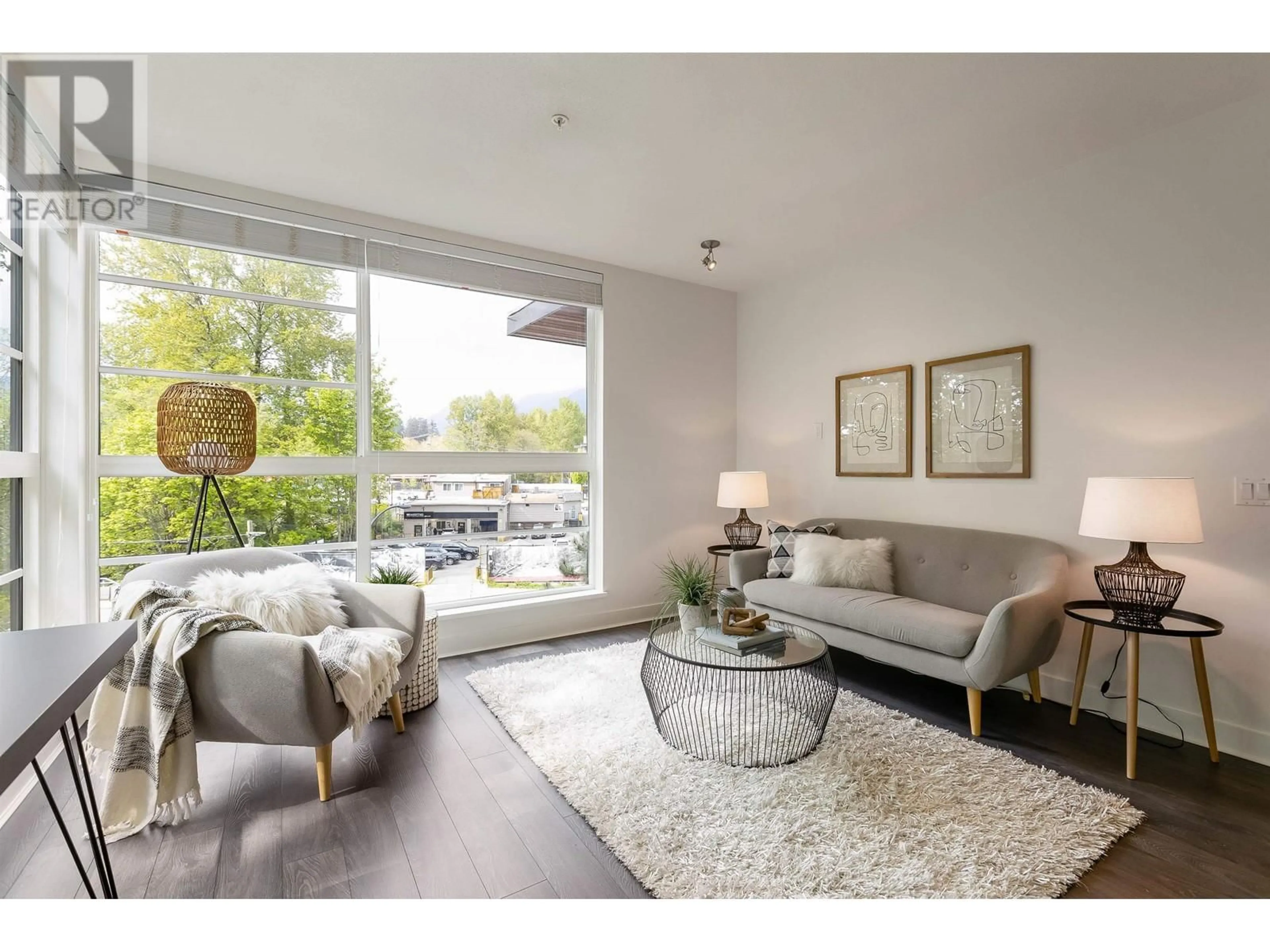 Living room, wood floors for 407 733 W 3RD STREET, North Vancouver British Columbia V7M0C8