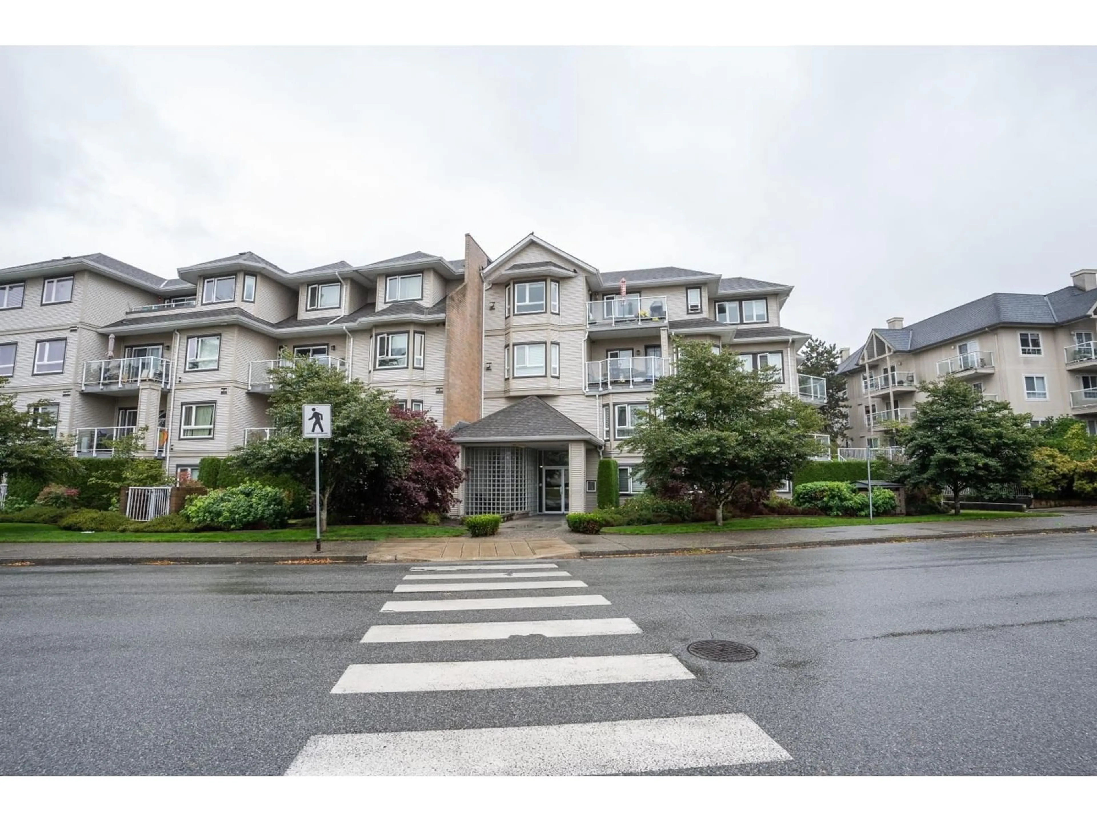 A pic from exterior of the house or condo, the street view for 113 8142 120A STREET, Surrey British Columbia V3W0N1