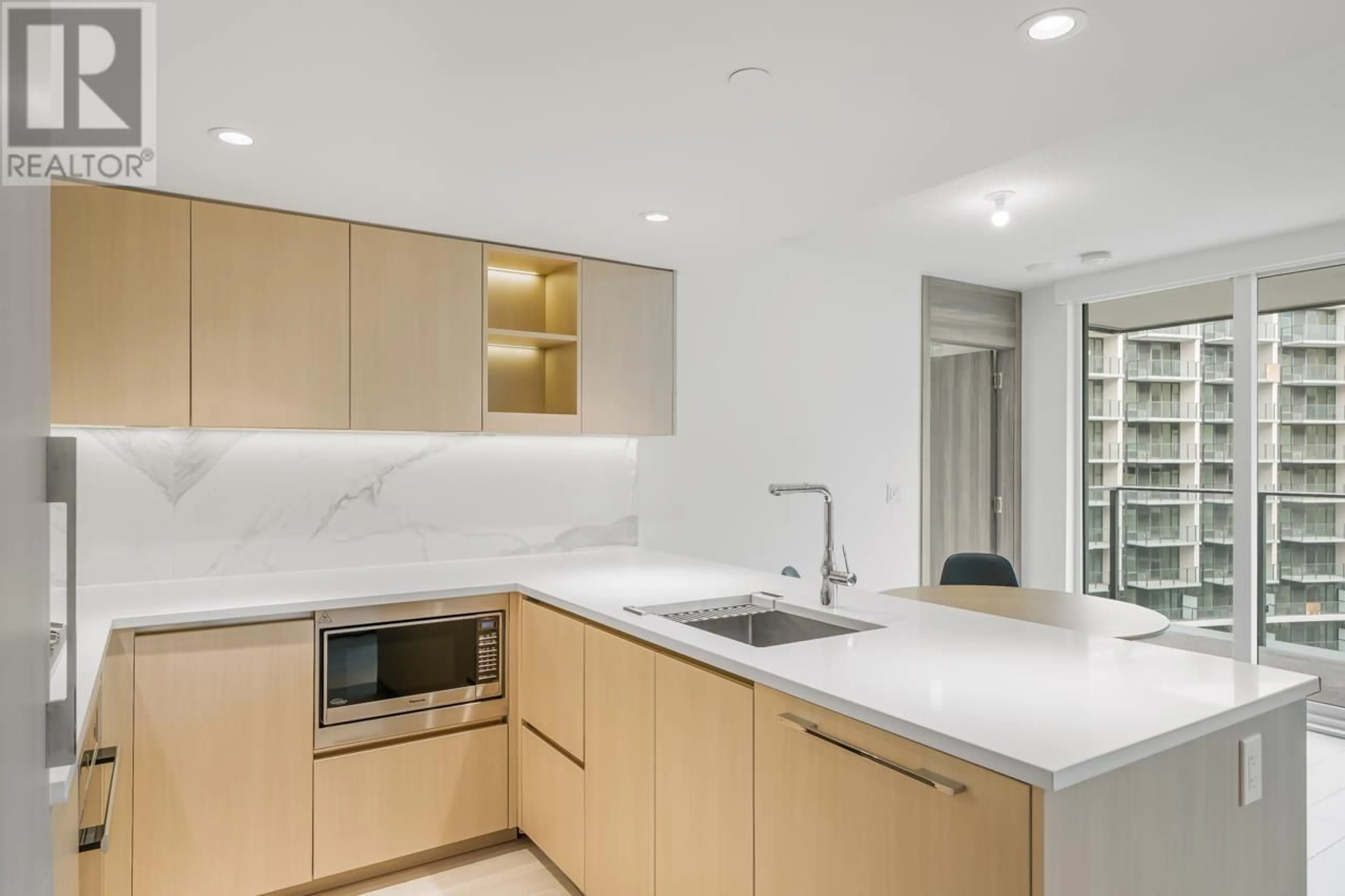 Open concept kitchen for 909 - 8555 CAPSTAN WAY, Richmond British Columbia V6X0W1
