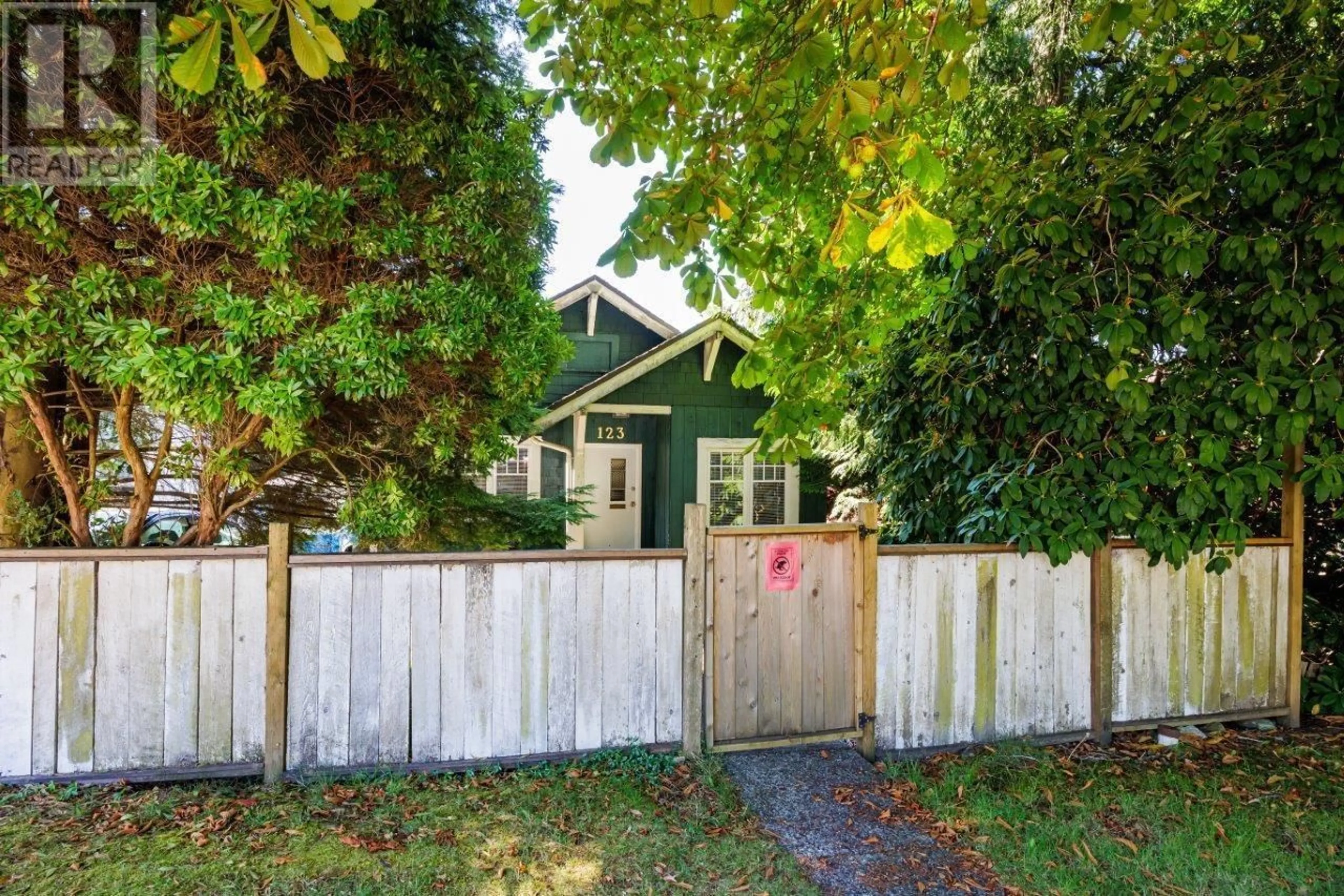 Frontside or backside of a home, the fenced backyard for 123 E KINGS ROAD, North Vancouver British Columbia V7N1H4