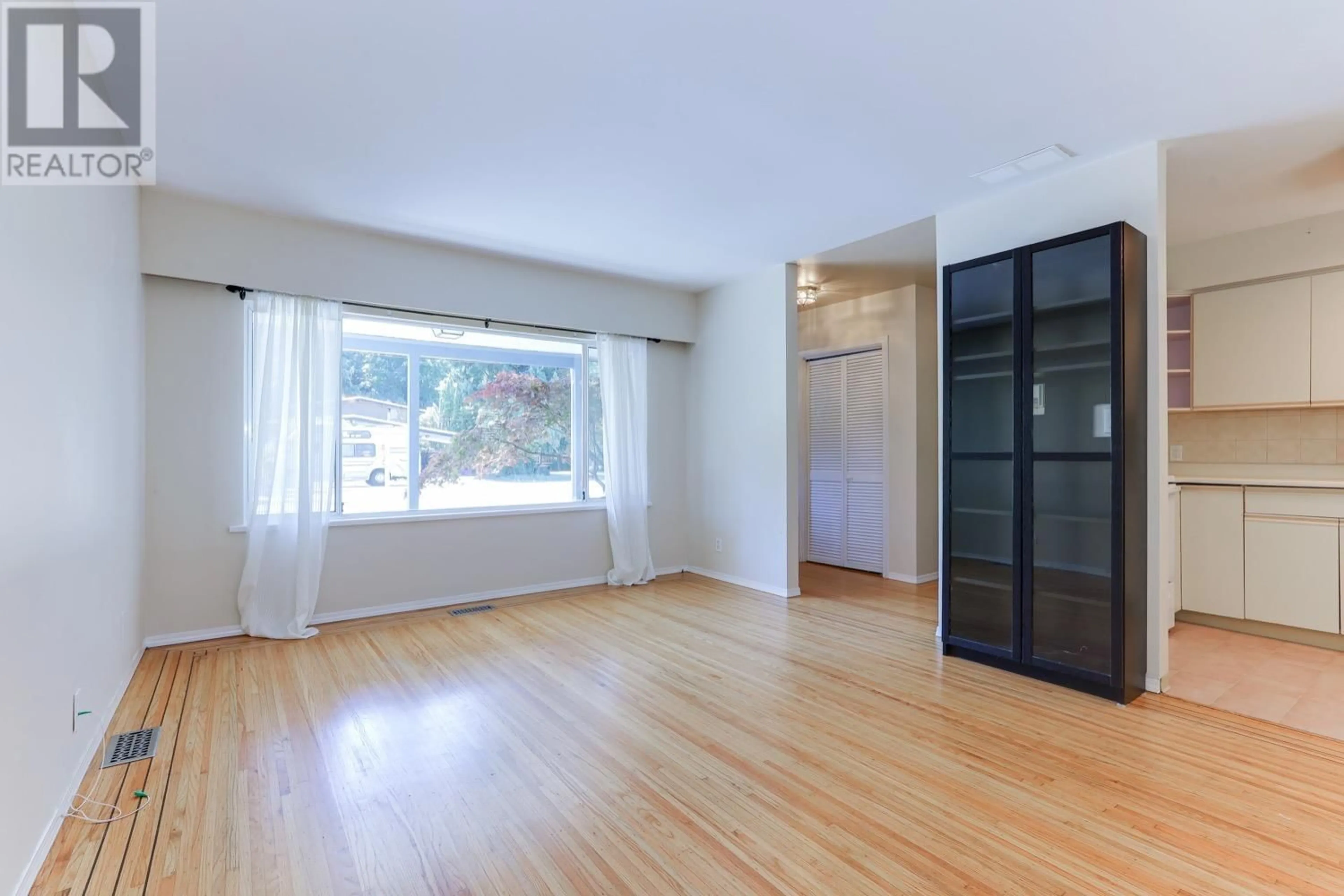 A pic of a room, wood floors for 5857 16 AVENUE, Delta British Columbia V4L1G8