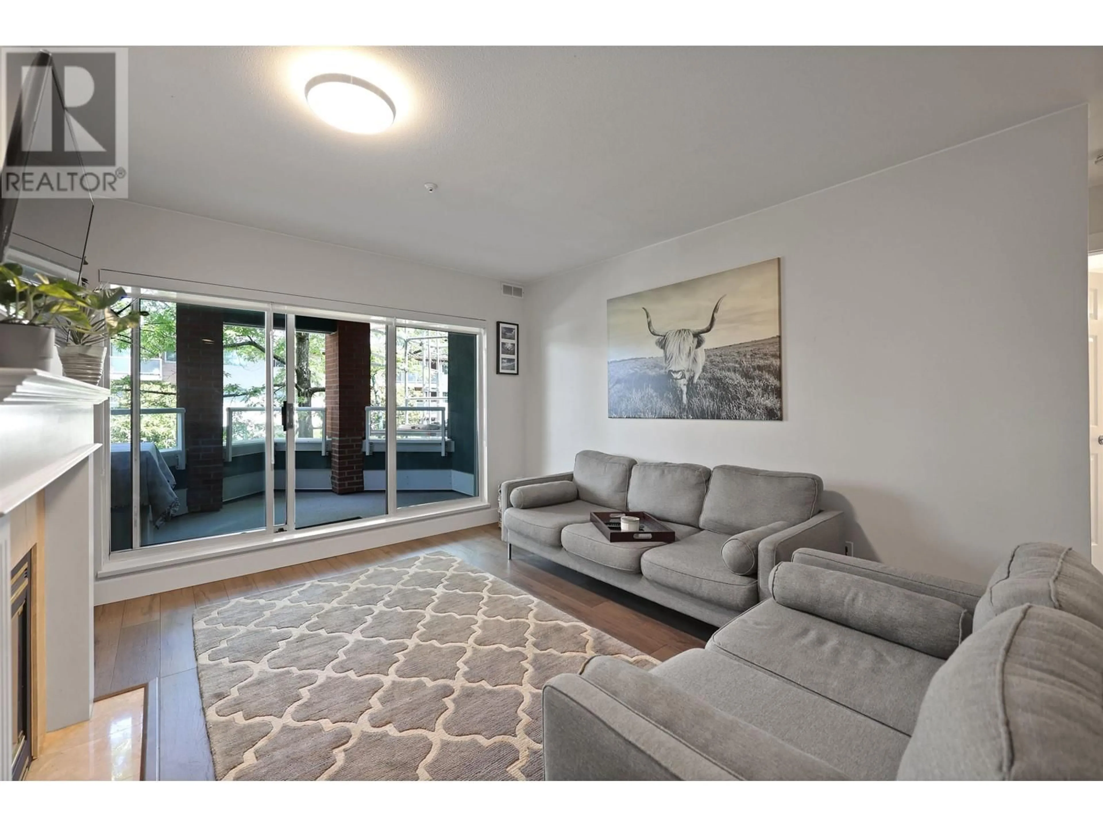 Living room, wood floors for 306 128 W 8TH STREET, North Vancouver British Columbia V7M3M1