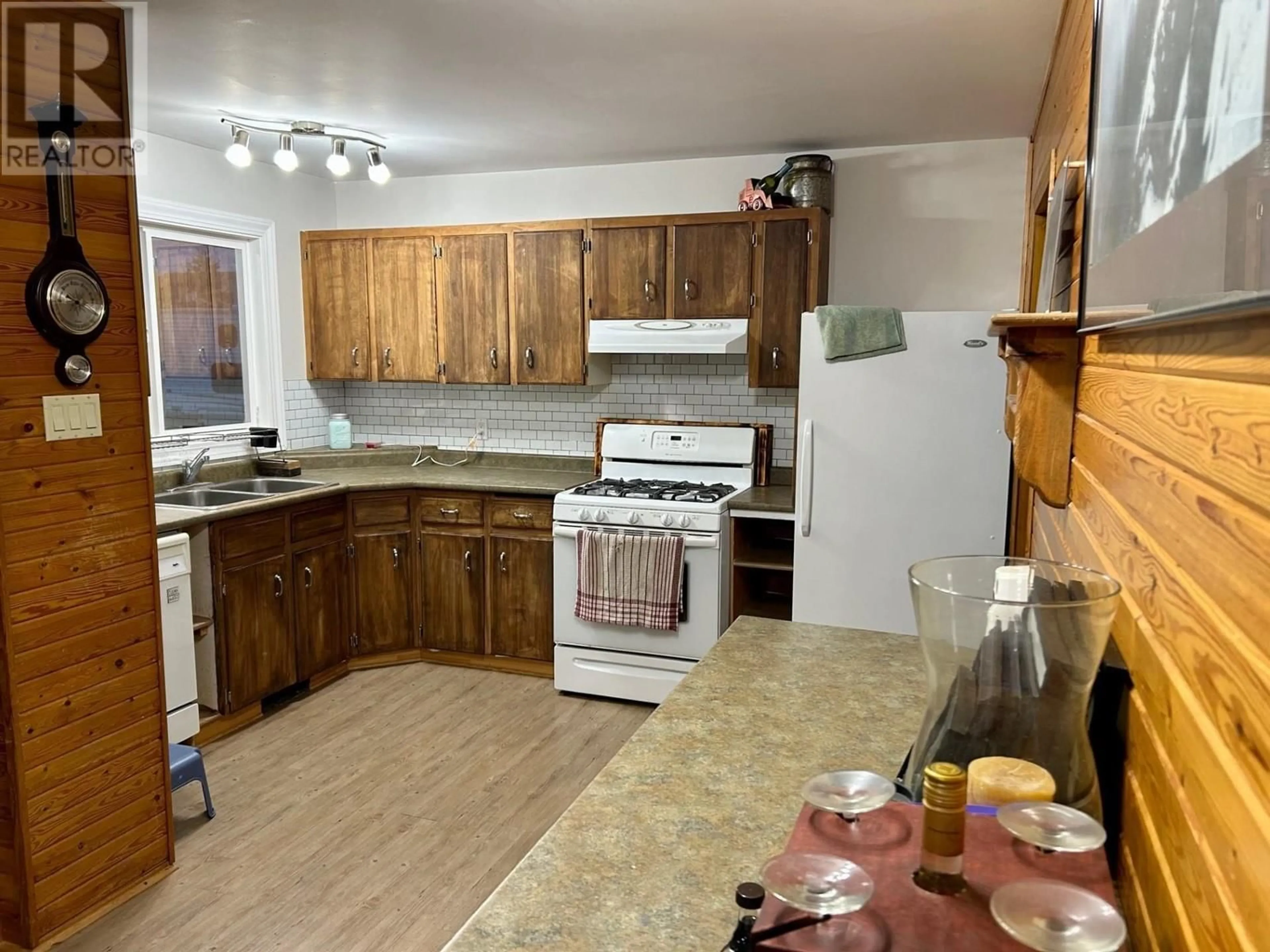 Standard kitchen, wood floors, cottage for 5316 W 54 AVENUE, Fort Nelson British Columbia V0C1R0