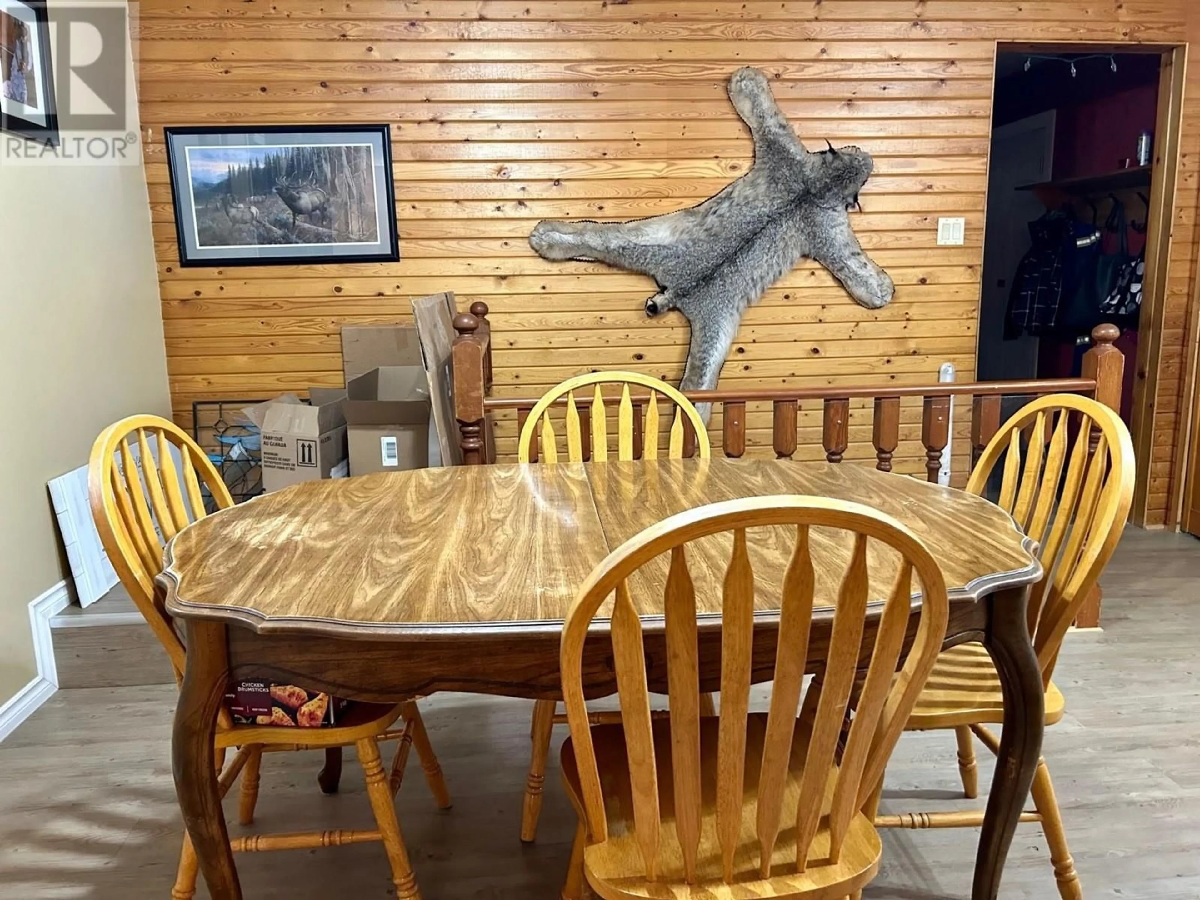 Dining room, wood floors, cottage for 5316 W 54 AVENUE, Fort Nelson British Columbia V0C1R0