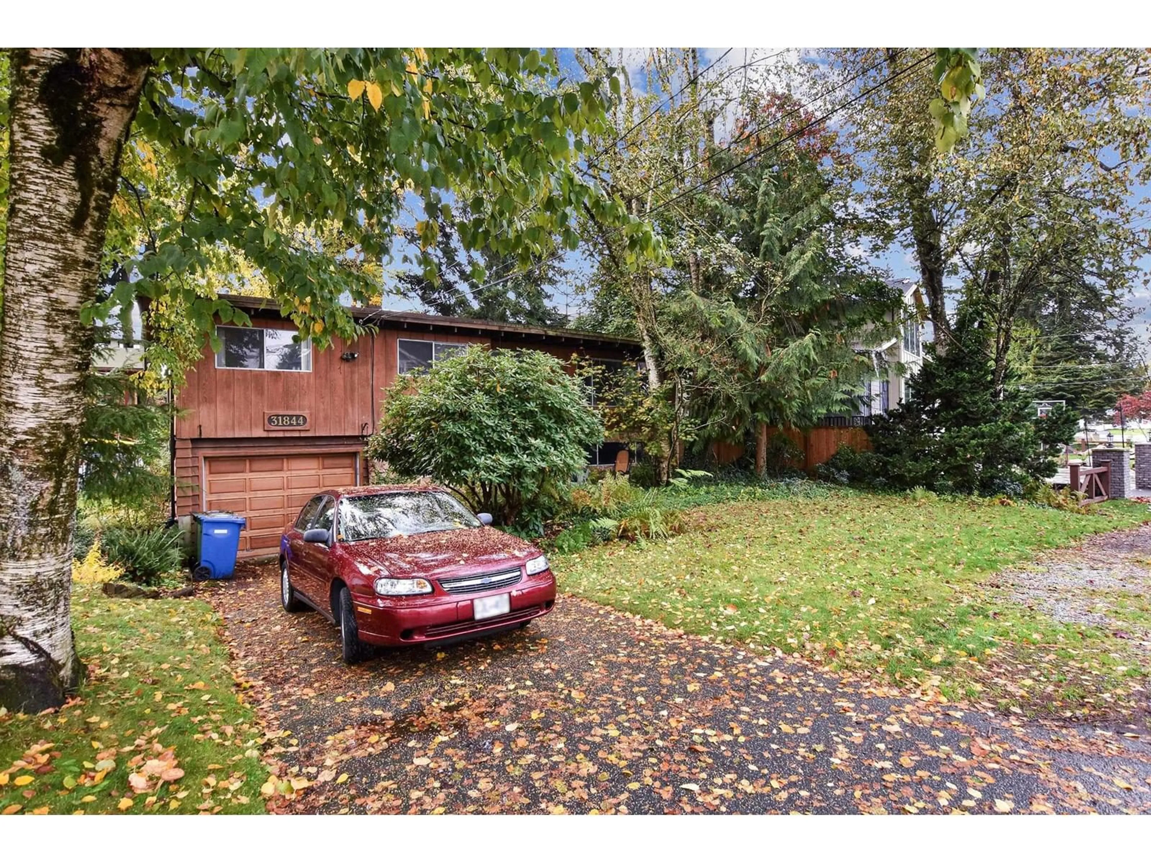 Frontside or backside of a home, the fenced backyard for 31844 CARLSRUE AVENUE, Abbotsford British Columbia V2T2J6