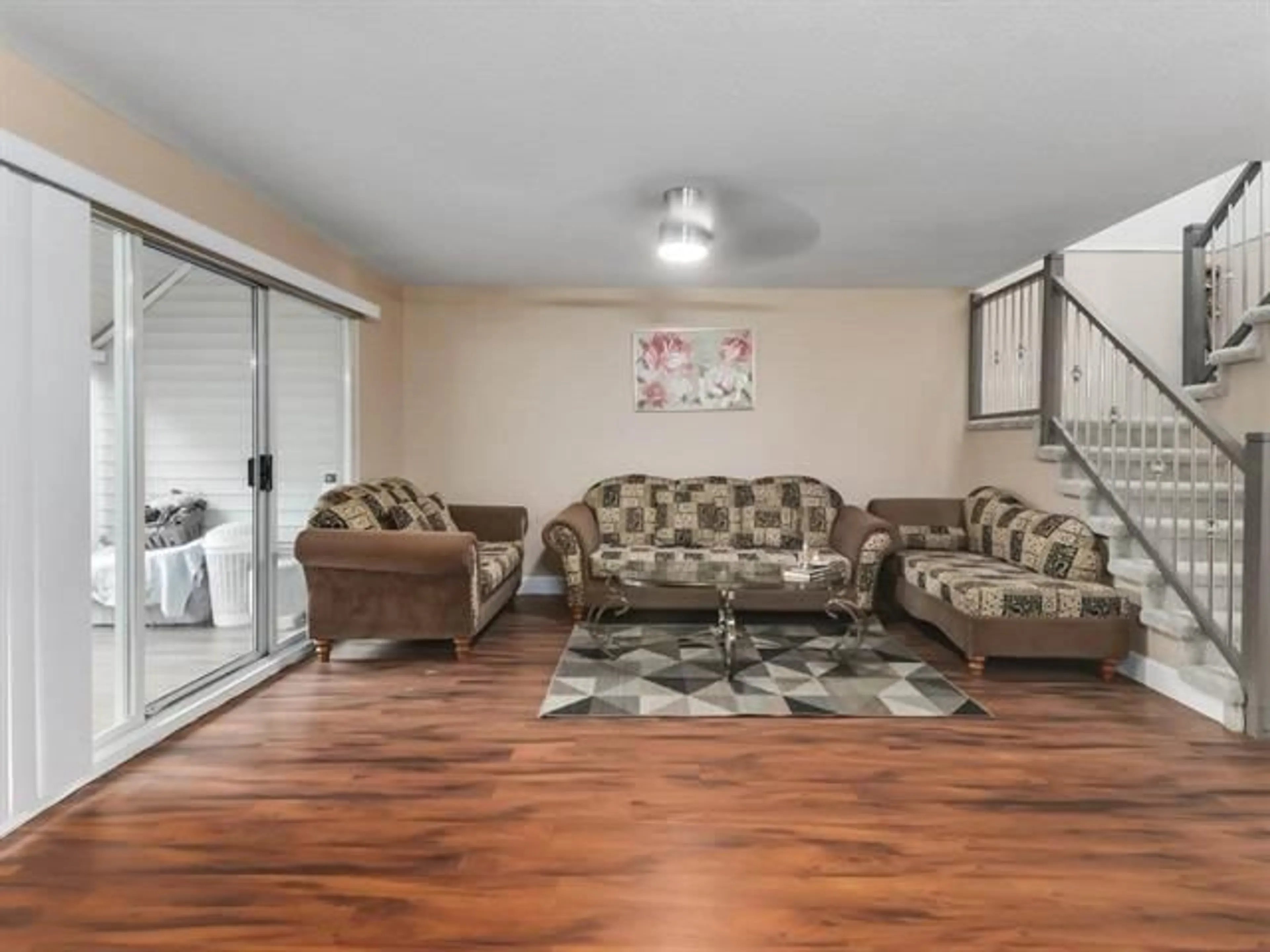 Living room, wood floors for 8 7536 138 STREET, Surrey British Columbia V3W9M4