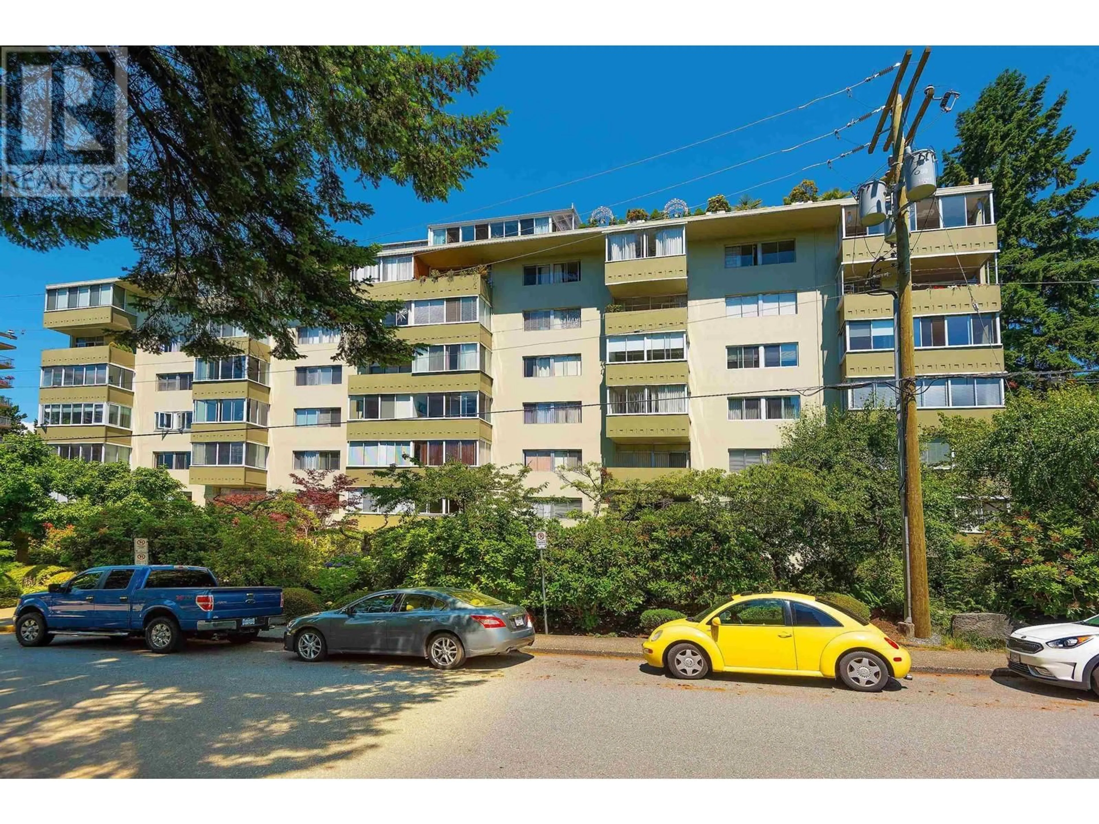 A pic from exterior of the house or condo, the street view for 609 1425 ESQUIMALT AVENUE, West Vancouver British Columbia V7T1L1